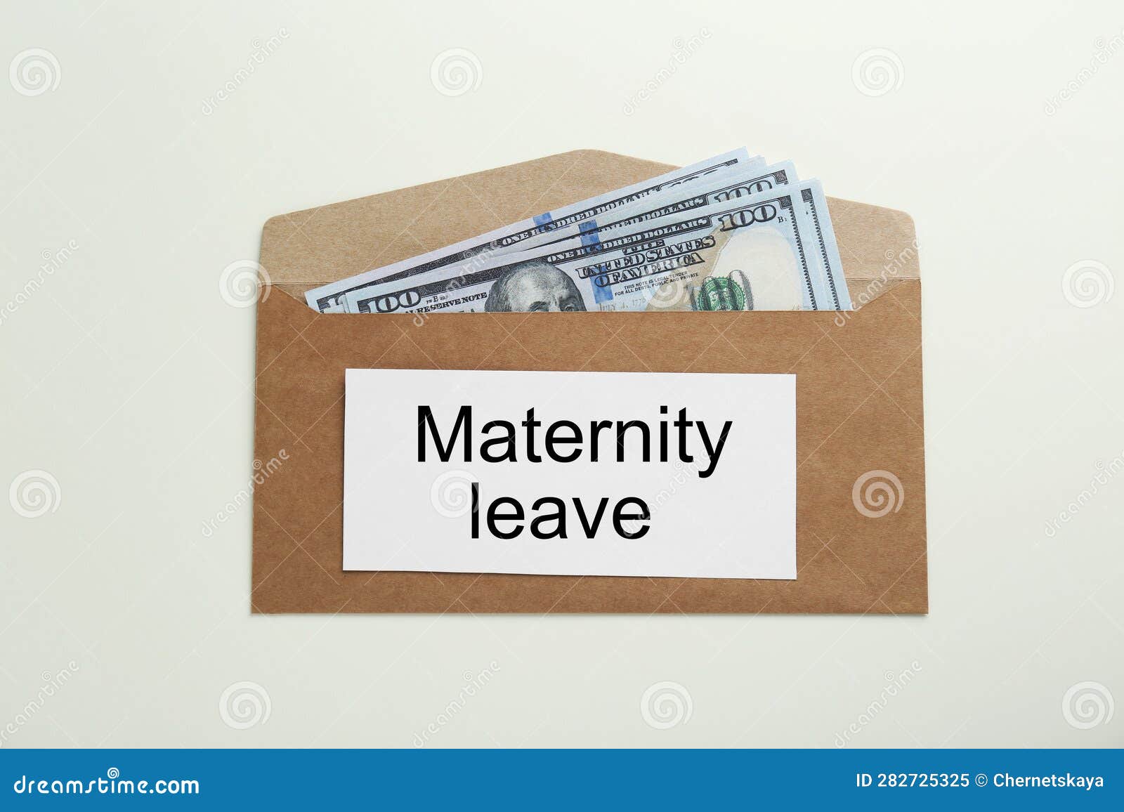 Maternity Leave Concept. Envelope with Dollar Banknotes and Note on