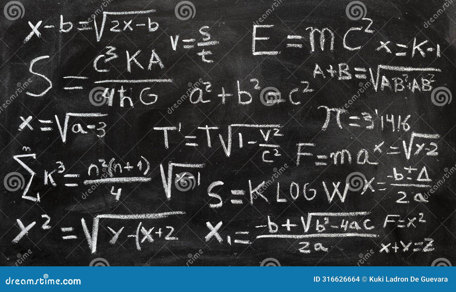 mathematical equations and physics formulas handwritten on blackboard