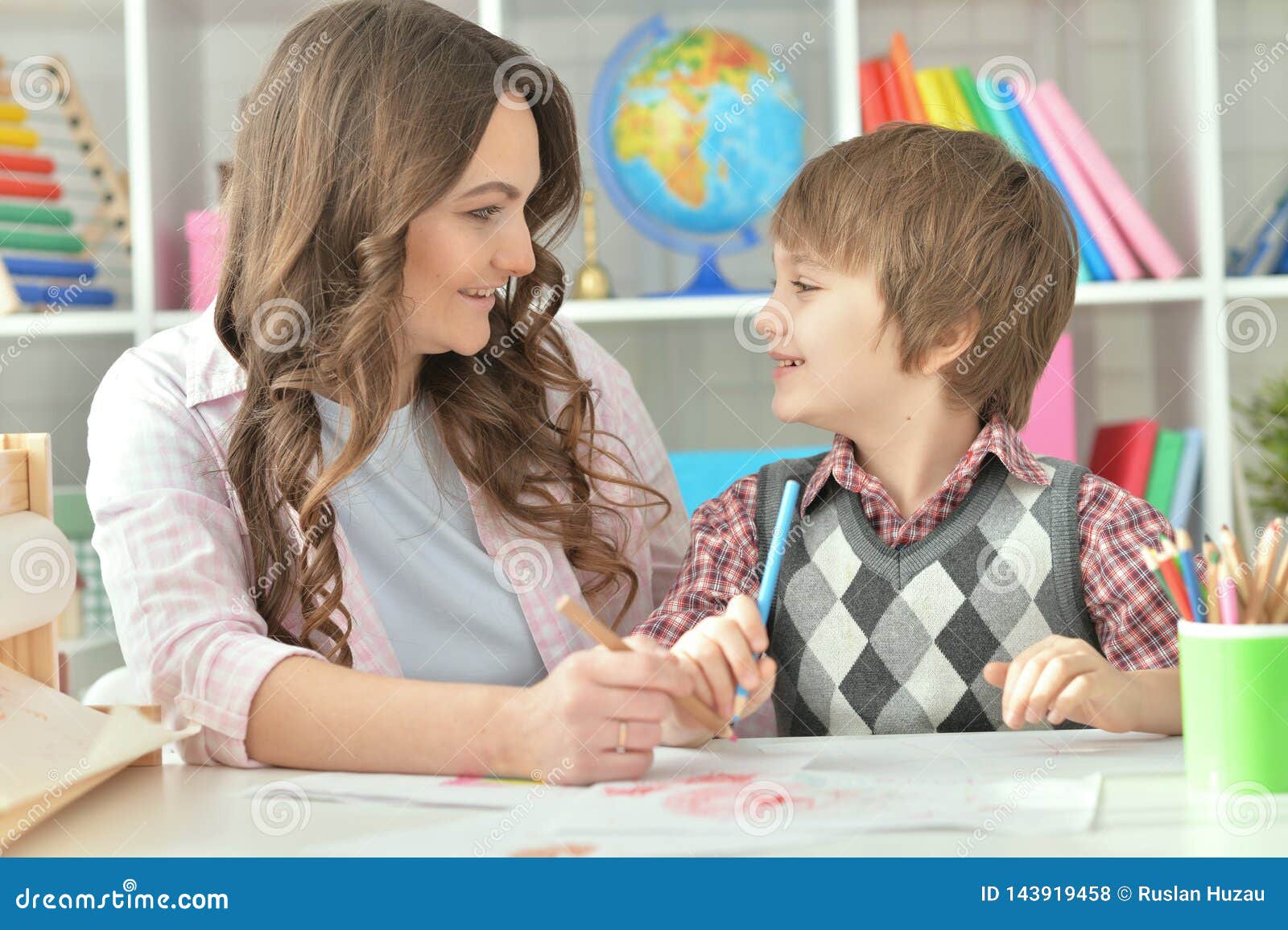 Mother and son drawing stock photo. Image of education - 143919458