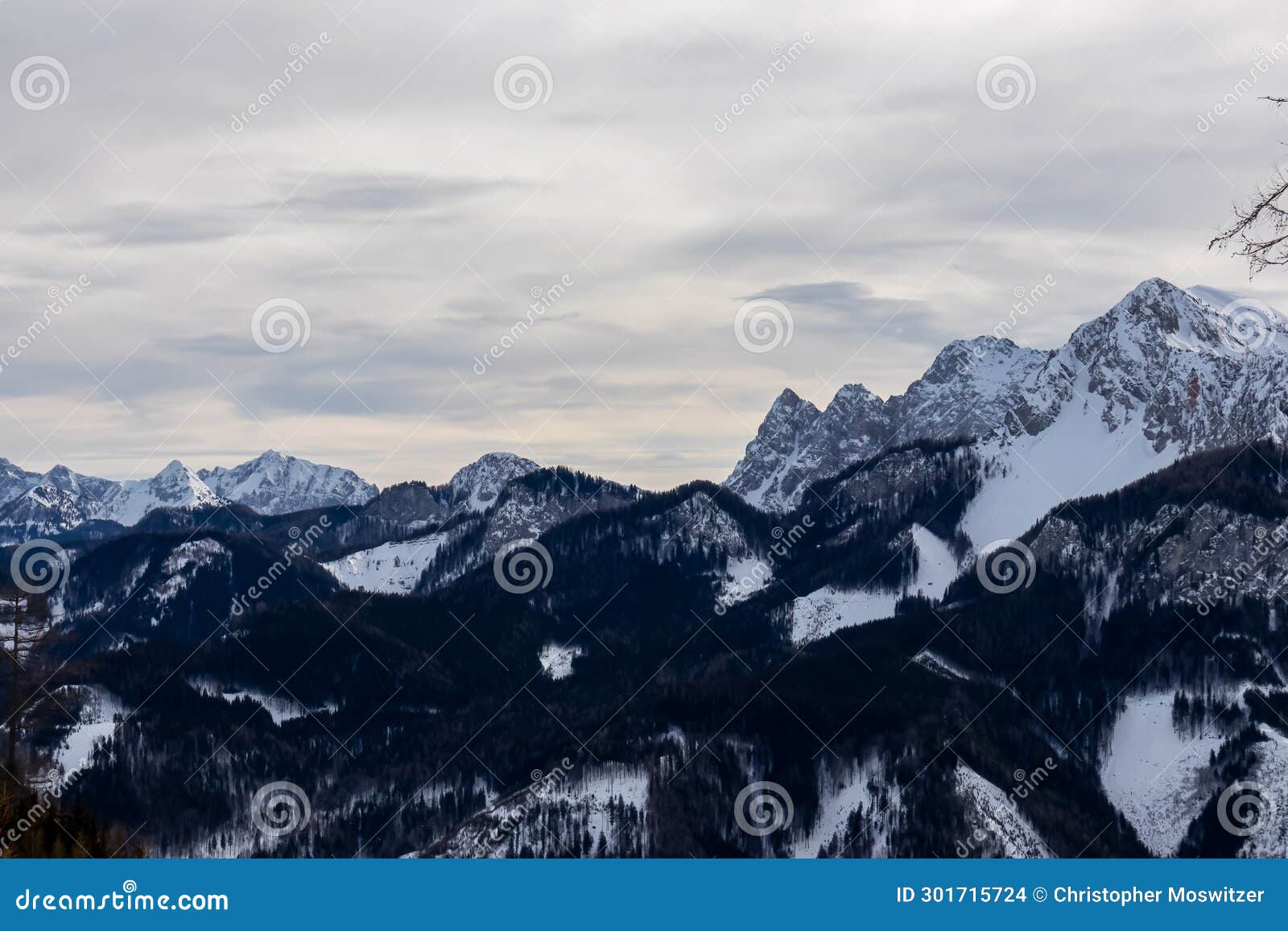matschacher gupf - panoramic view on snow capped mountain peaks of karawanks and julian alps in carinthia