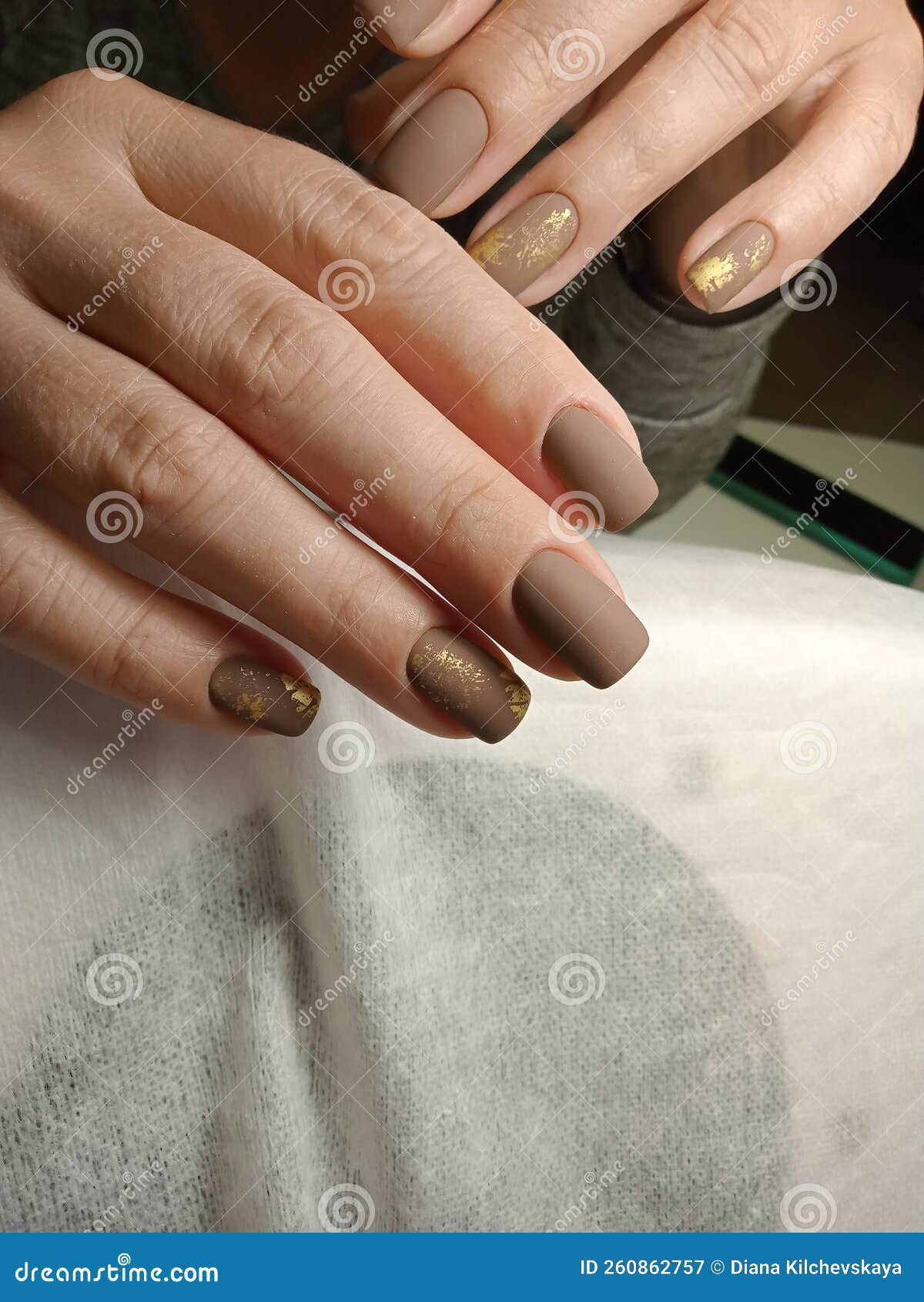 Matte brown gel polish stock image. Image of hand, organ 260862757