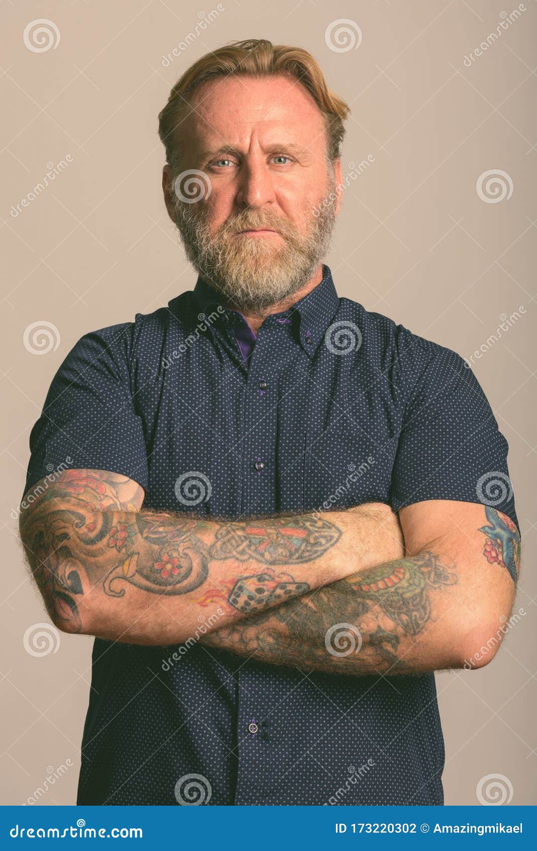 Mature Bearded Man with Hand Tattoos with Arms Crossed in Gray Background Stock Photo - Image of portrait, close: 173220302 Mature Bearded Man with Hand Tattoos with Arms Crossed in Gray Background Stock Photo - Image of portrait, close: 173220302