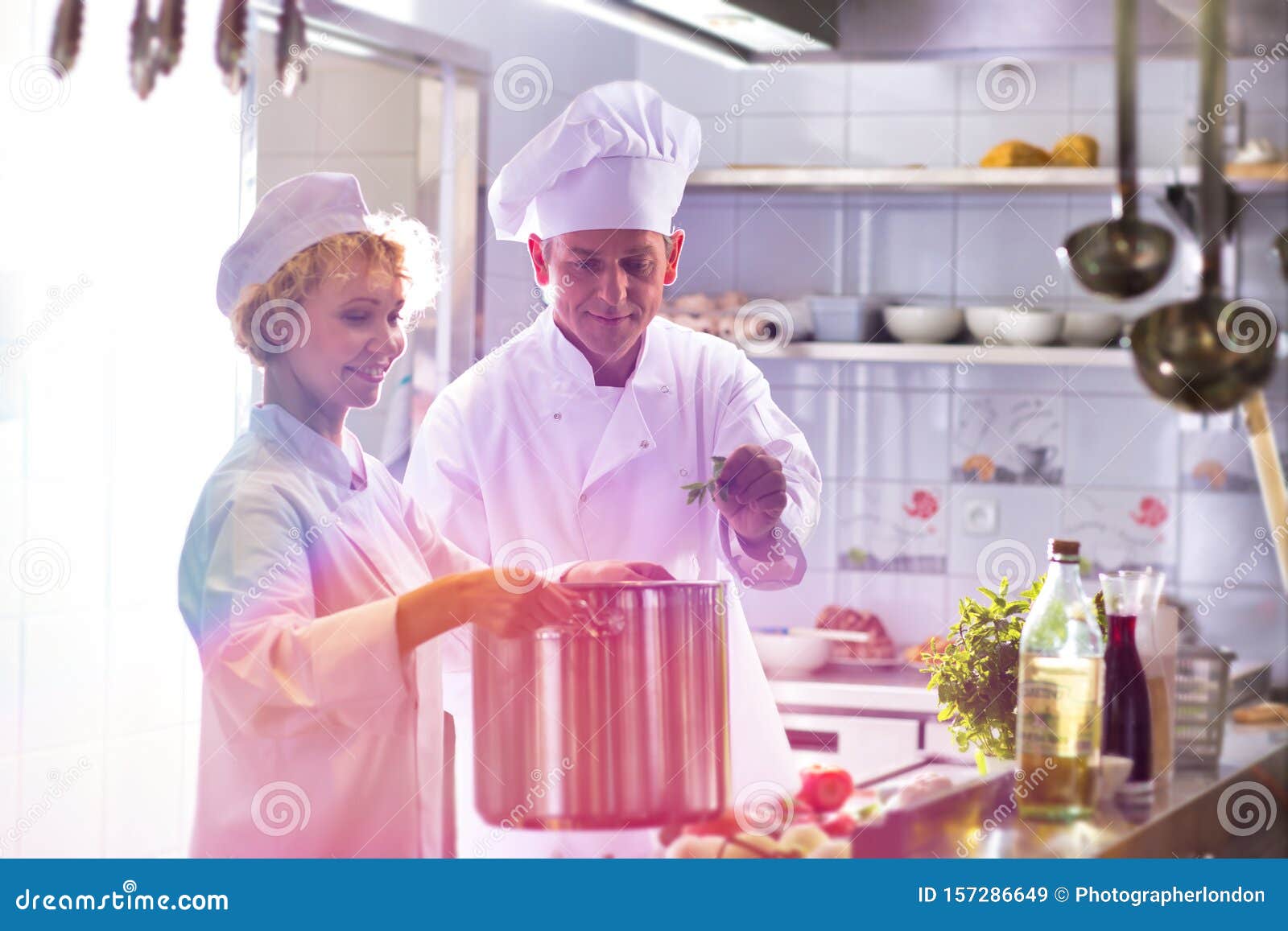 Mature Chefs Cooking in Pot at Restaurant Kitchen Stock Image Image