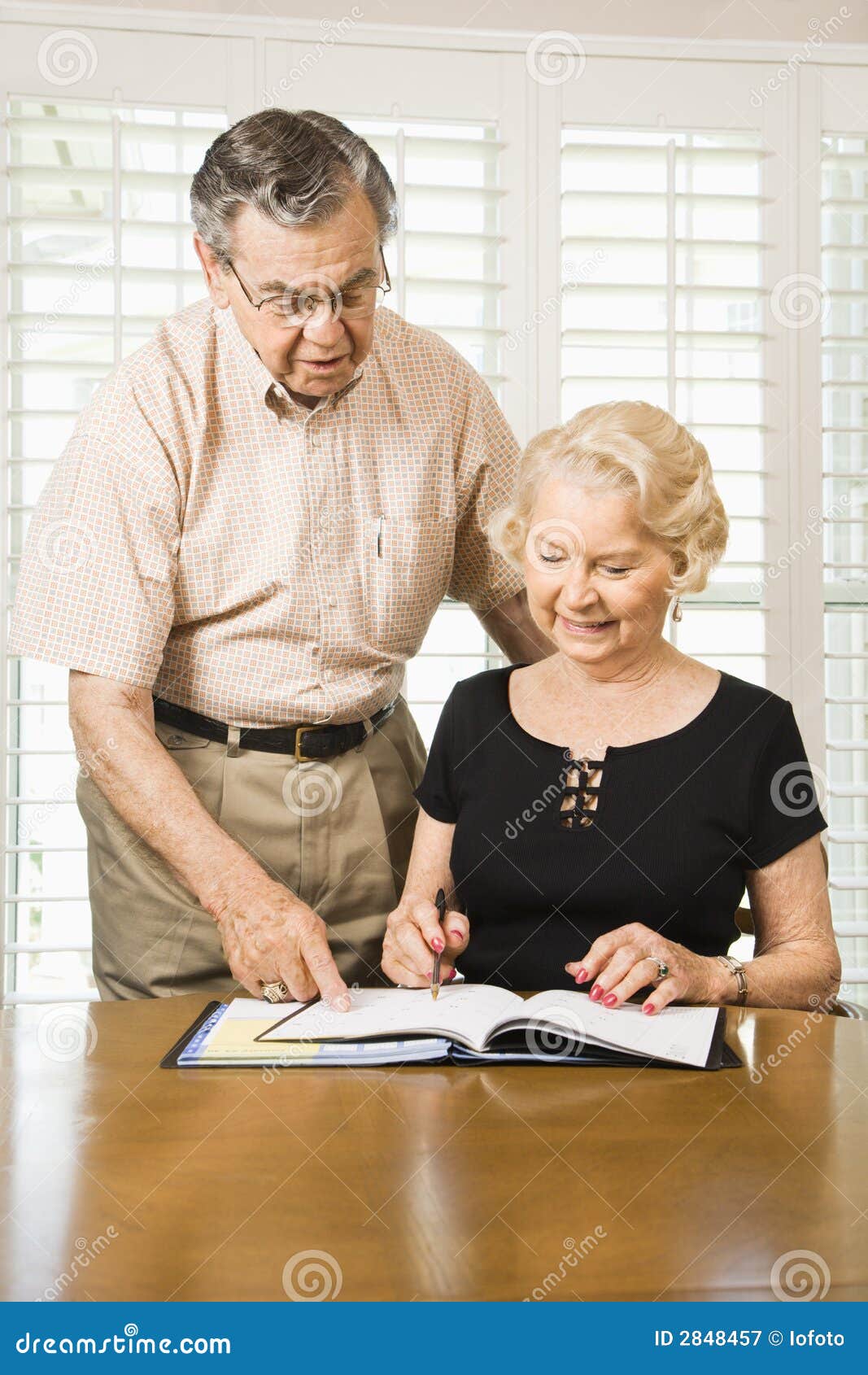 Mature Couple With Calendar Stock Image Im