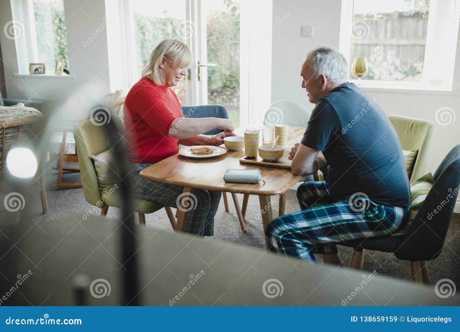 Mature Couple Enjoying Breakfast At Home Stock Image Image Of Emotio