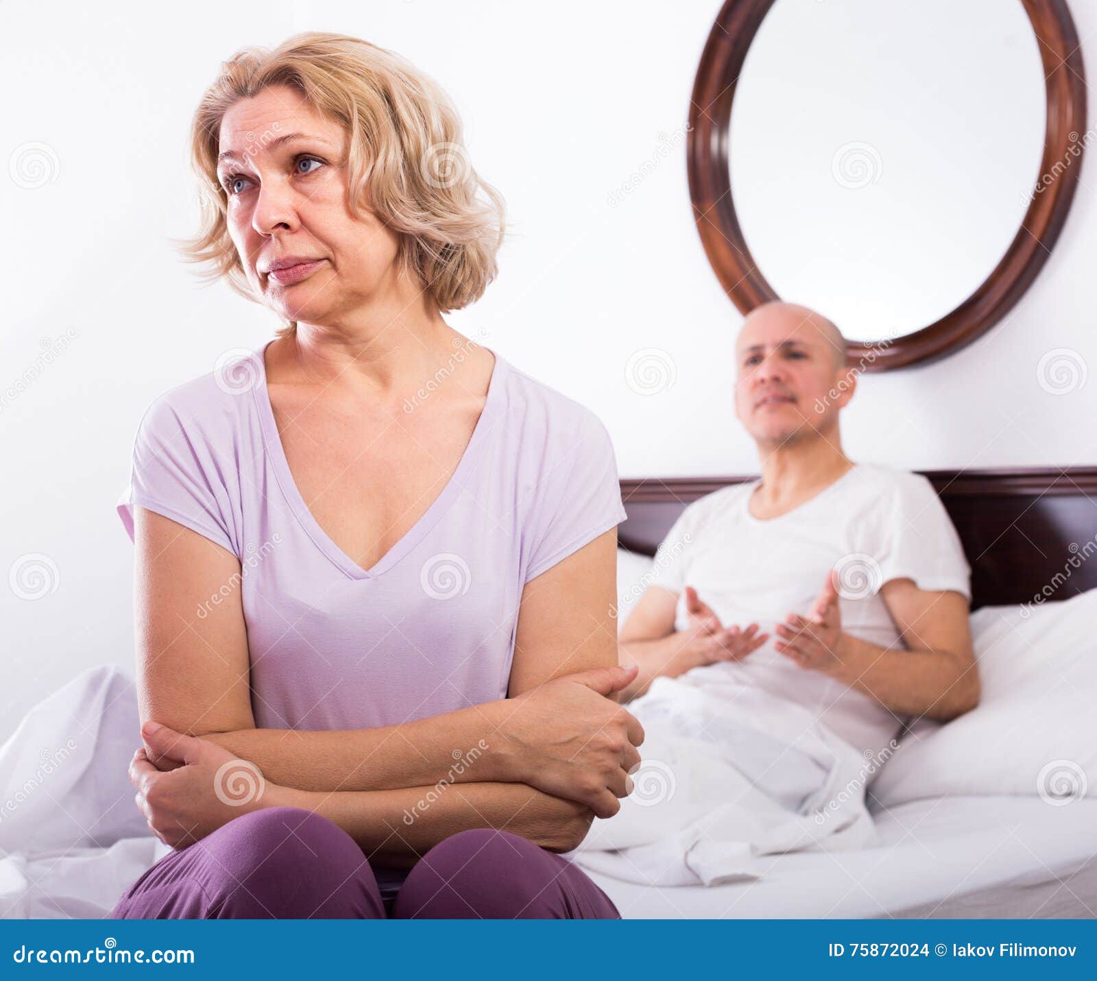 Mature Couple Having Quarrel In Bedroom Stock Photo Image Of Male