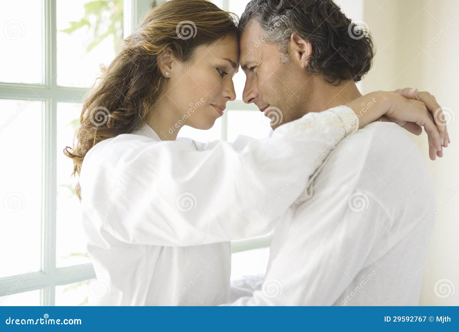 Mature Couple Hugging By Garden Doors Stock Image Image
