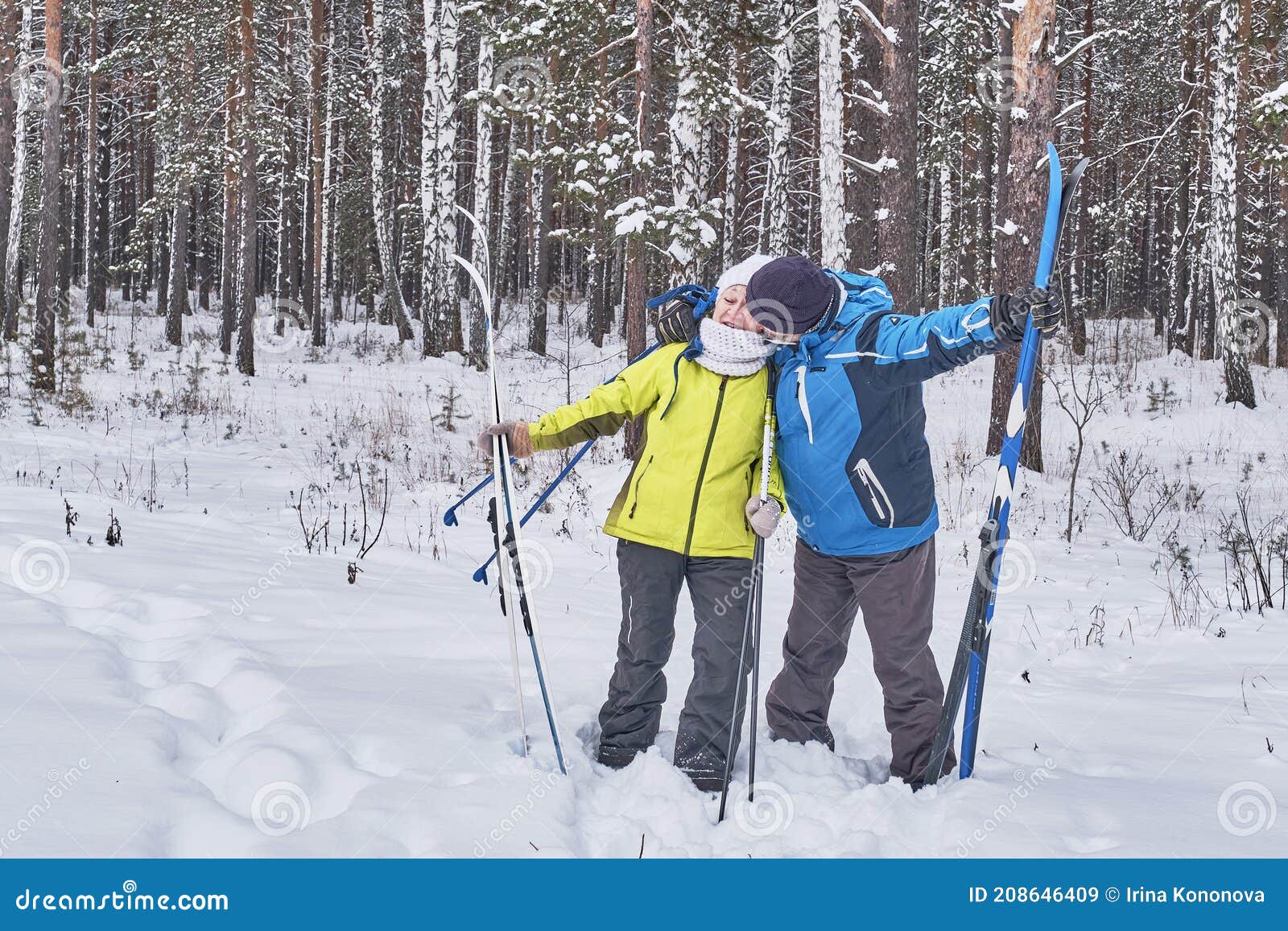 Mature Couple in Winter Sportswear with Cross-country Skis Kissing in Snowy  Forest Stock Image - Image of cold, countryside: 208646409