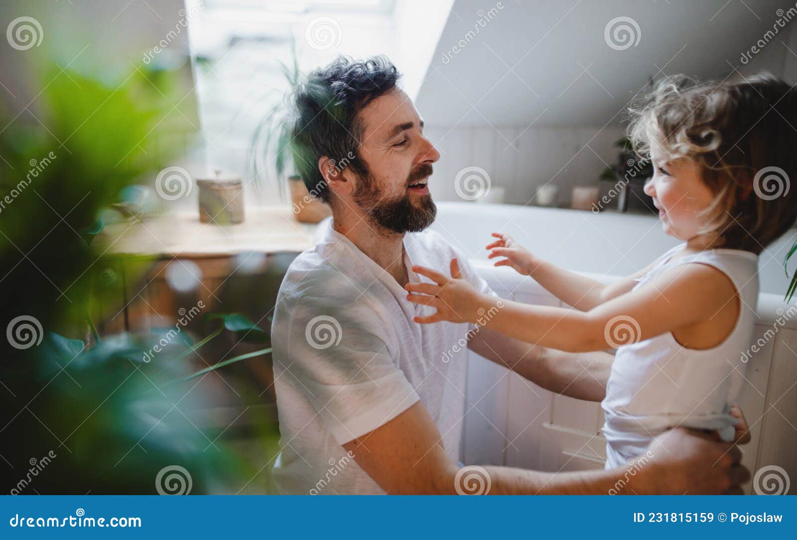 Mature Father With Small Daughter Indoors At Home Getting Ready For A Bath Stock Image Image