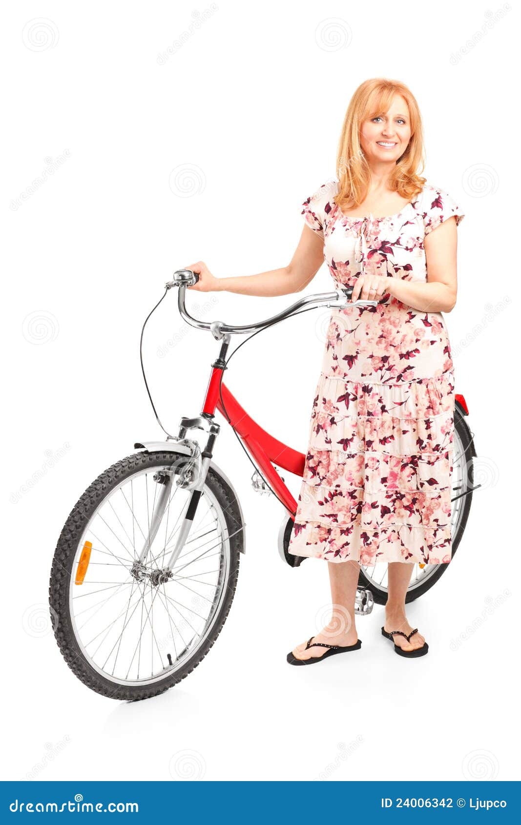 Mature Female Posing Next To a Bicycle Stock Photo Image of holding