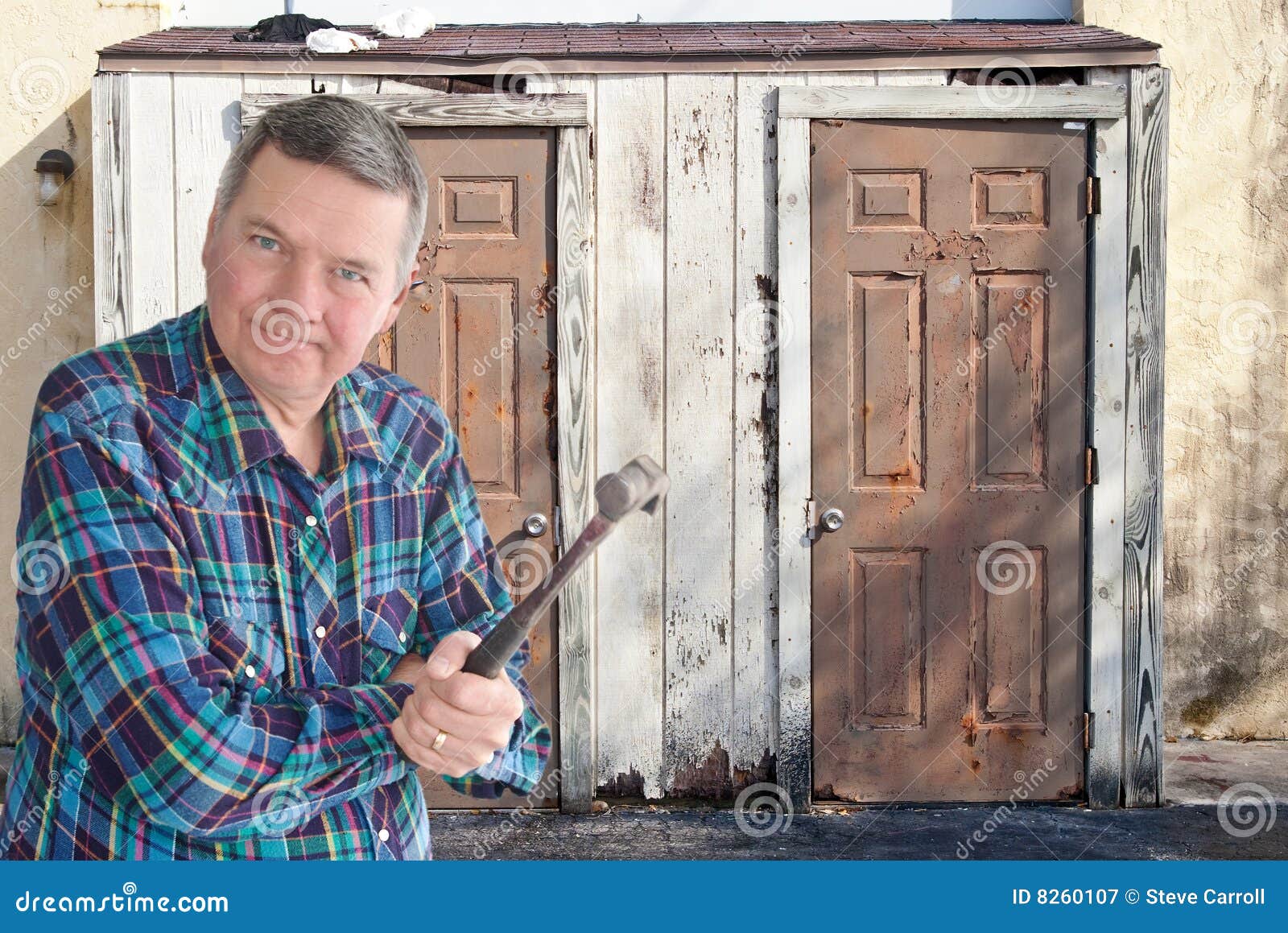 Mature Handyman with Hammer Getting Ready To Tear Stock Image Image