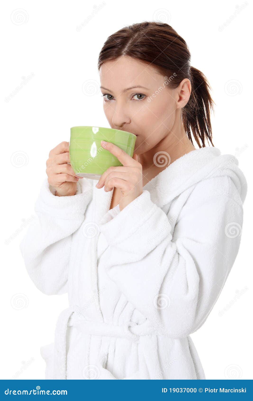Mature Lady In Bathrobe Drinking From Mug Stock Photo - Image: 19037000