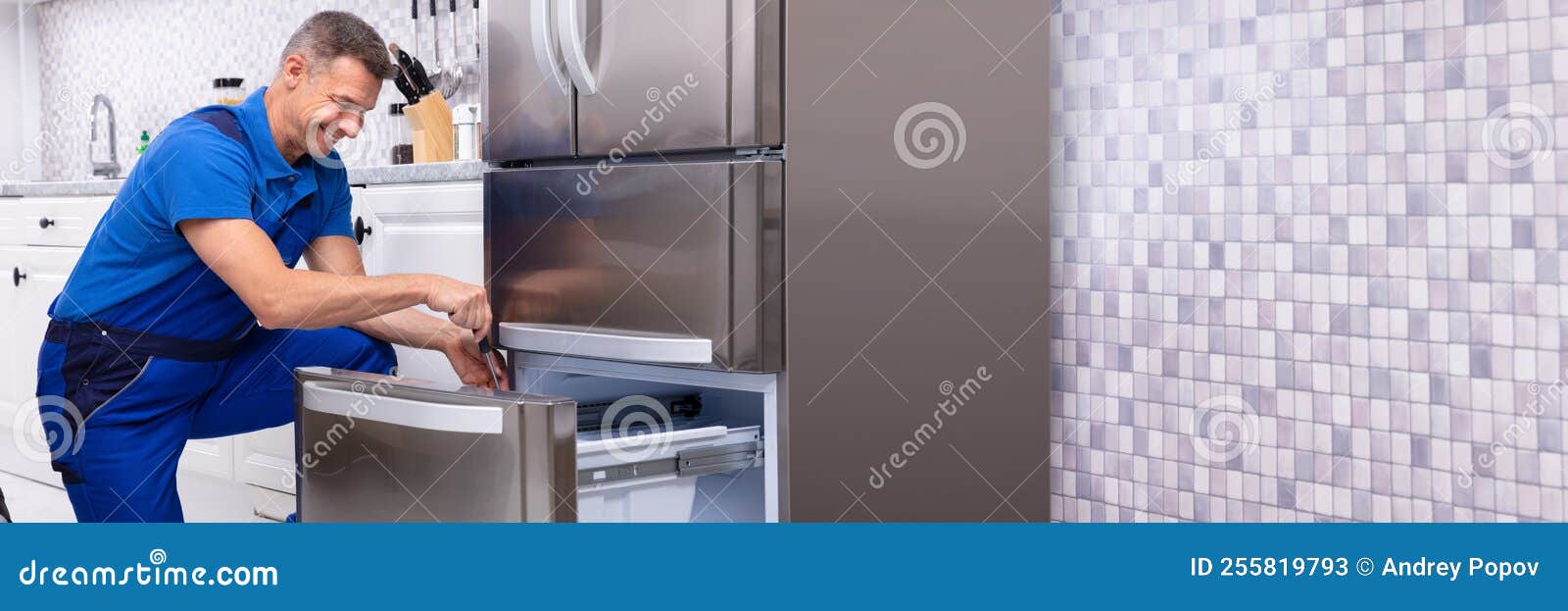 Serviceman Repairing Refrigerator Stock Image Image of fixing