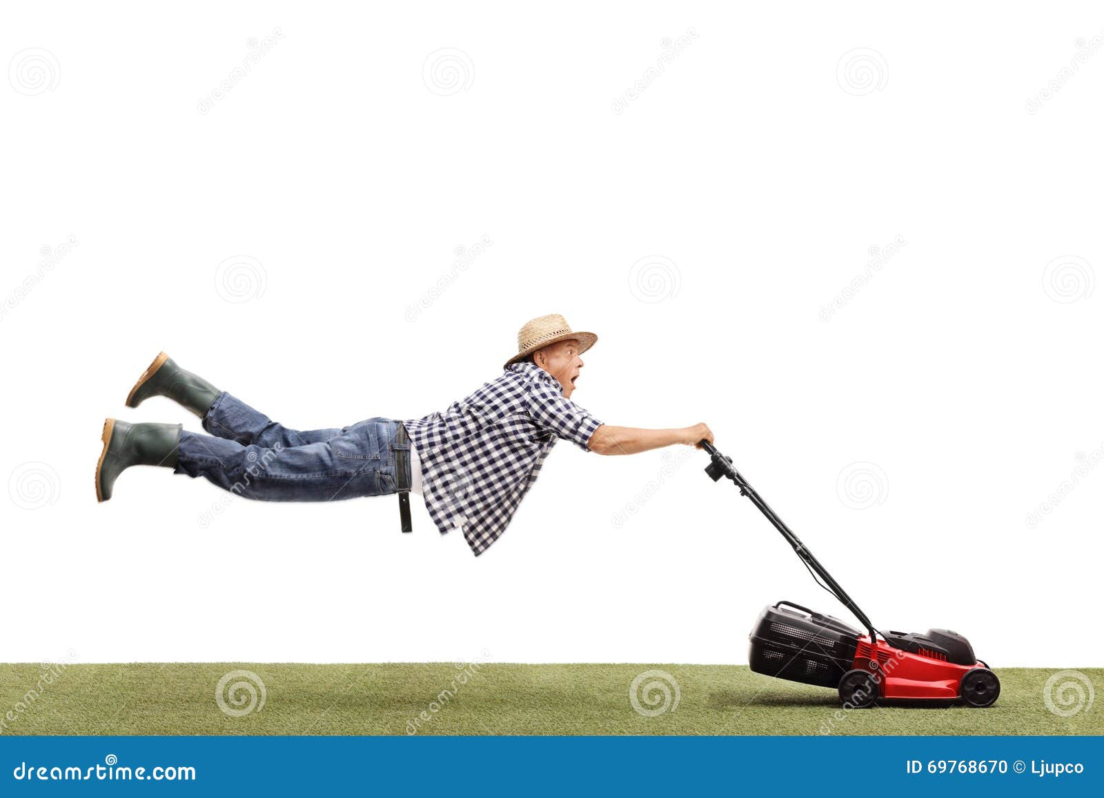 Mature Man Being Pulled By A Lawn Mower Stock Photo Image 69768670