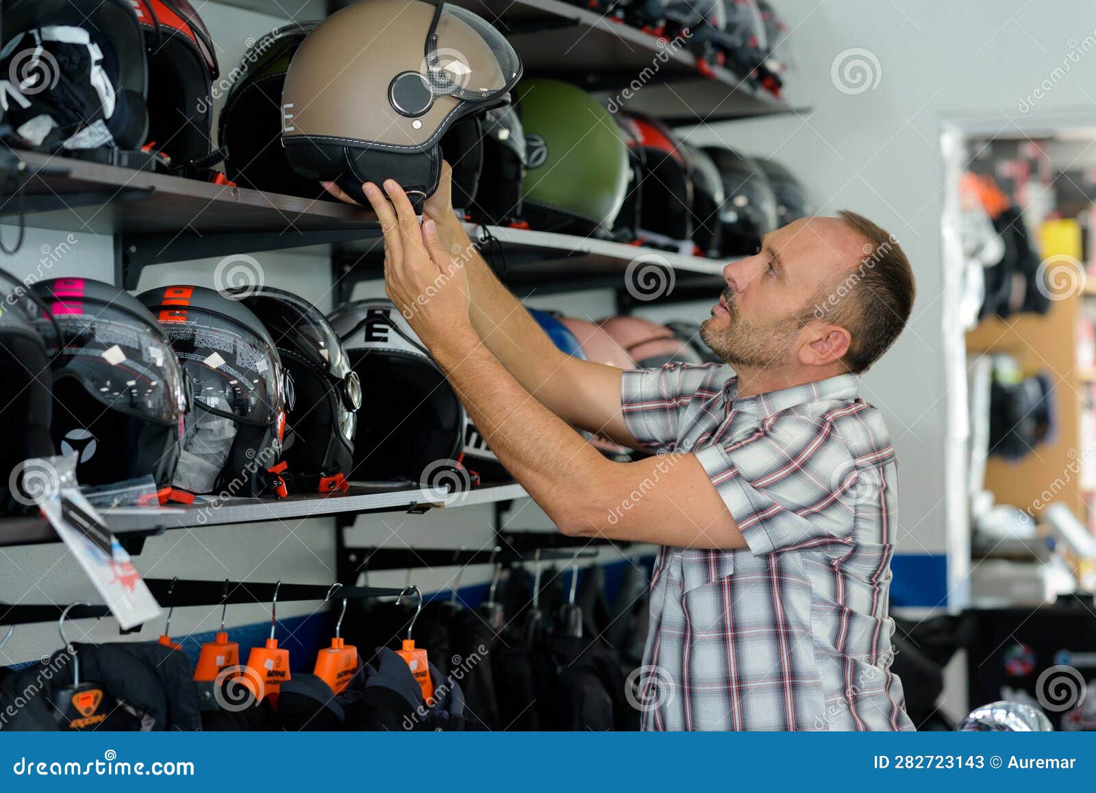 Mature Man Choosing Crash Helmet in Store Stock Image Image of caucasian, purchase 282723143