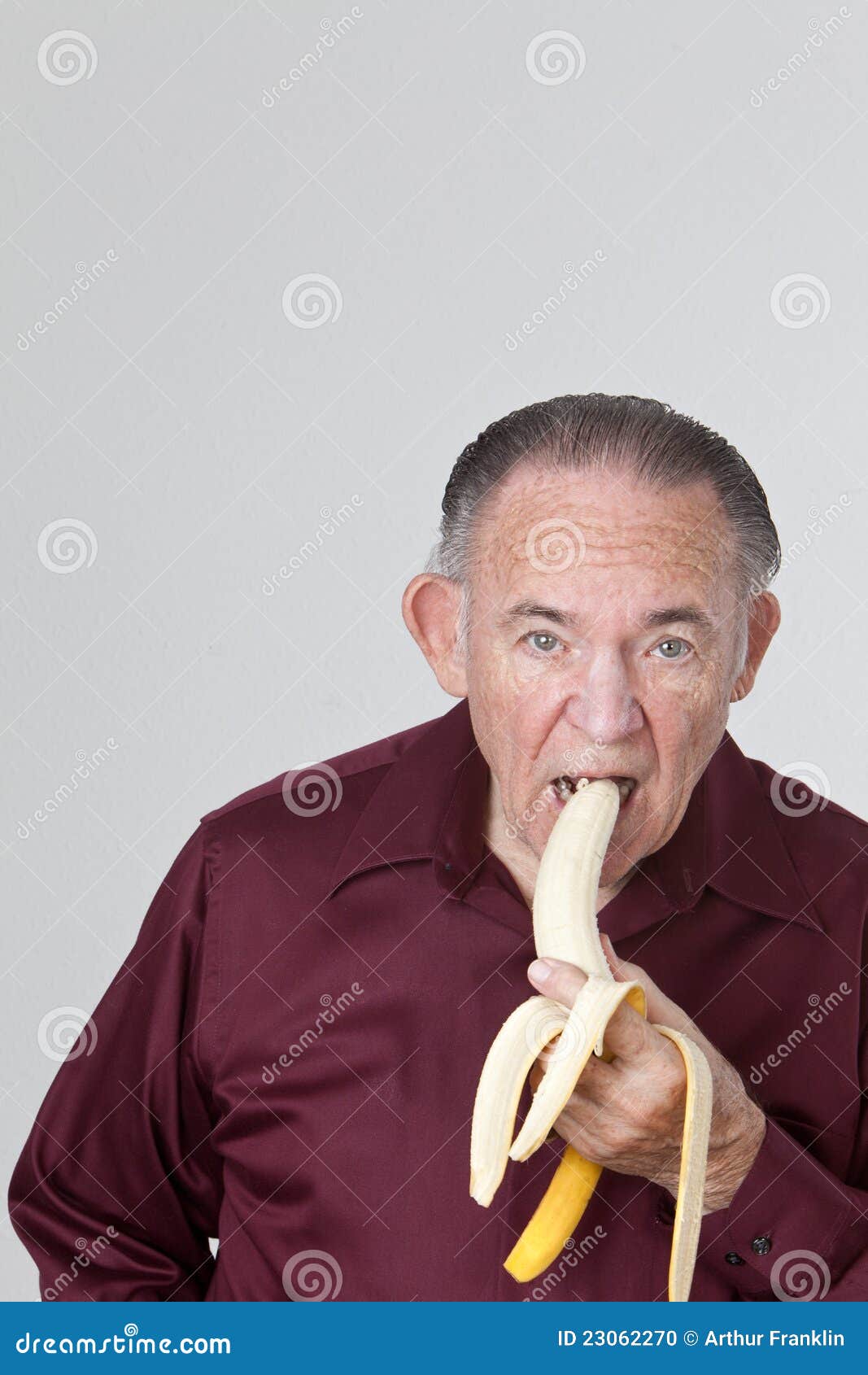 Mature Man Eating Banana Stock Photo Image 23062270