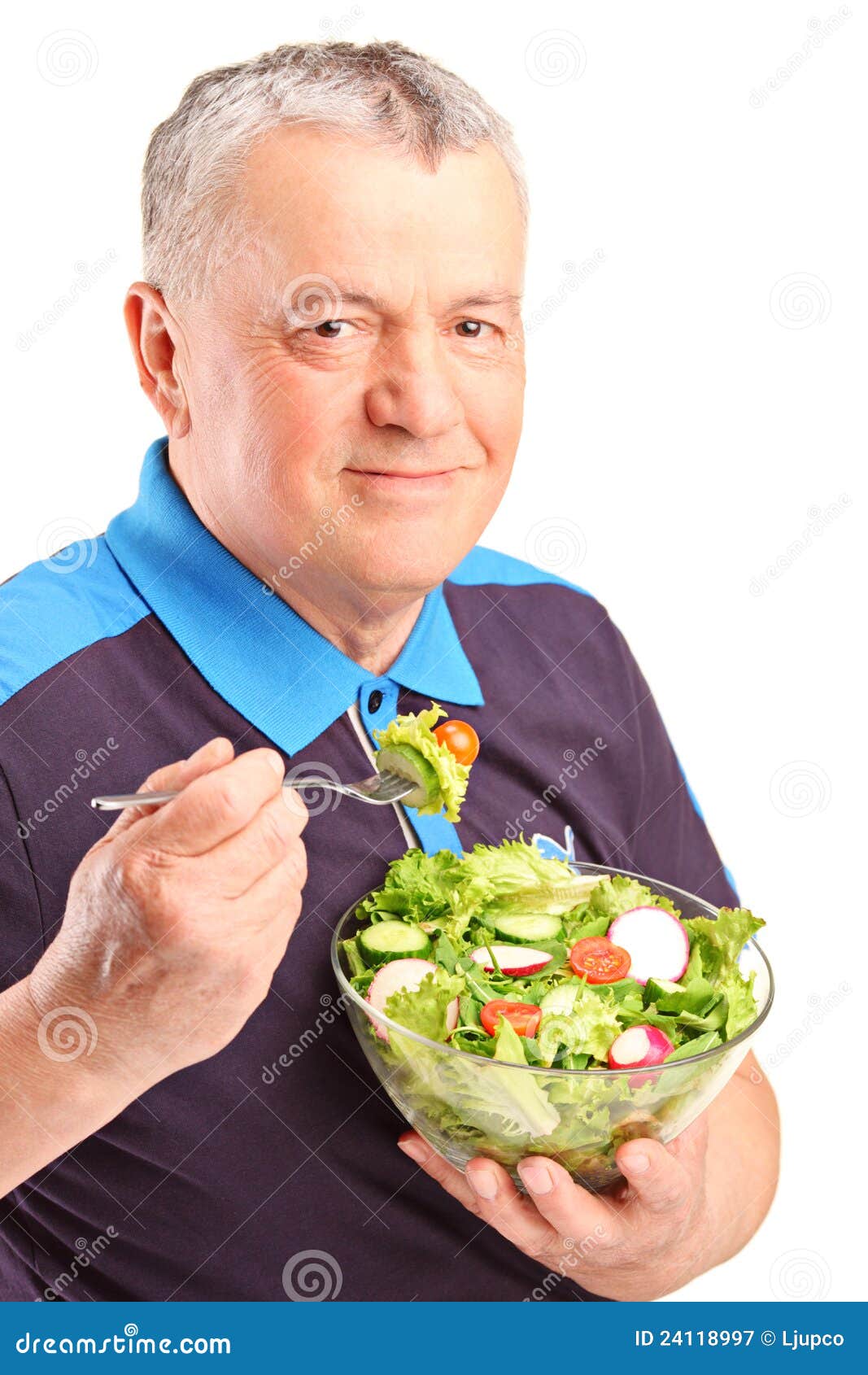 A mature man eating salad stock image. Image of looking - 24118997