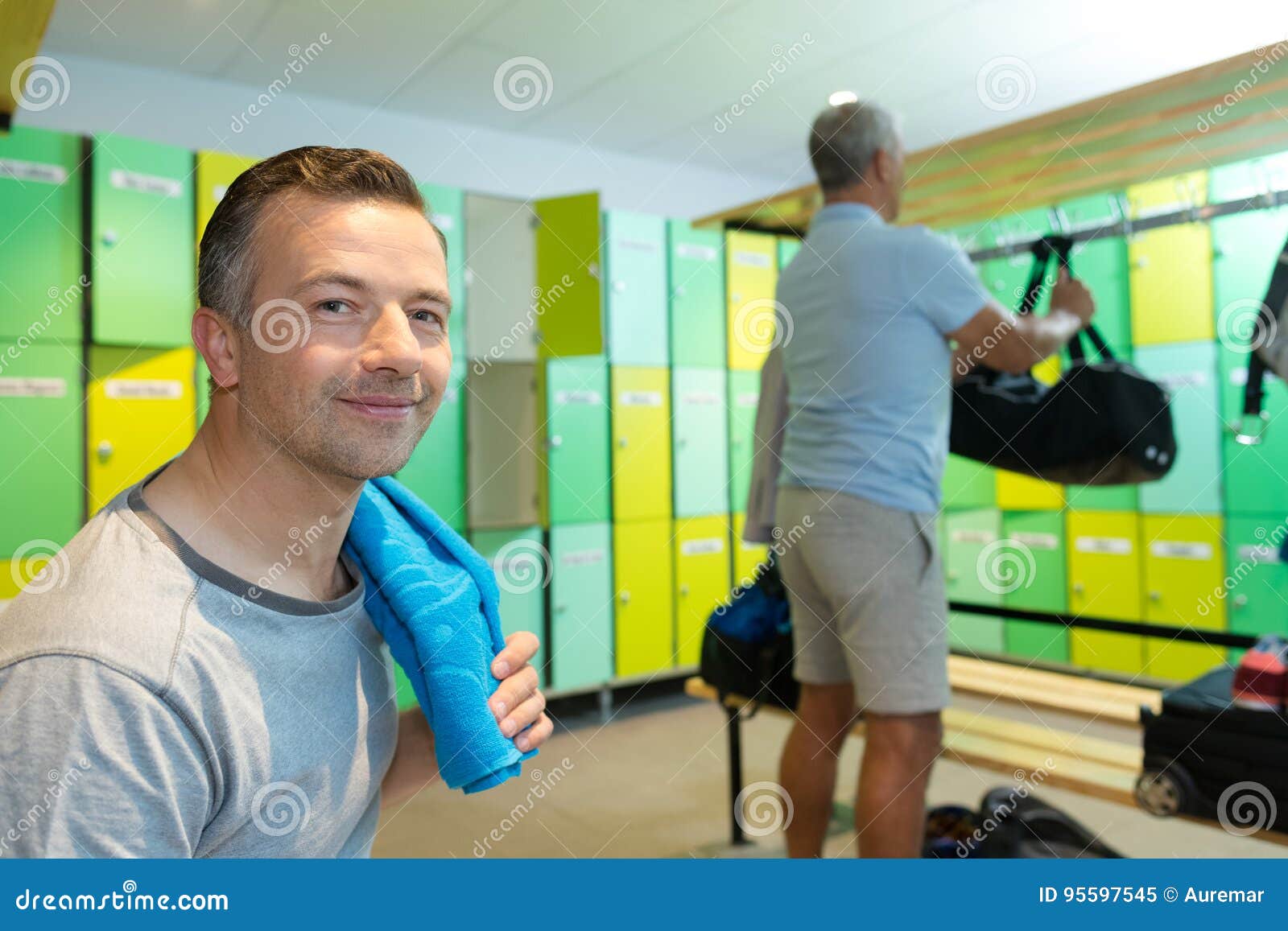 Mature man in locker room stock image. Image of open 95597545