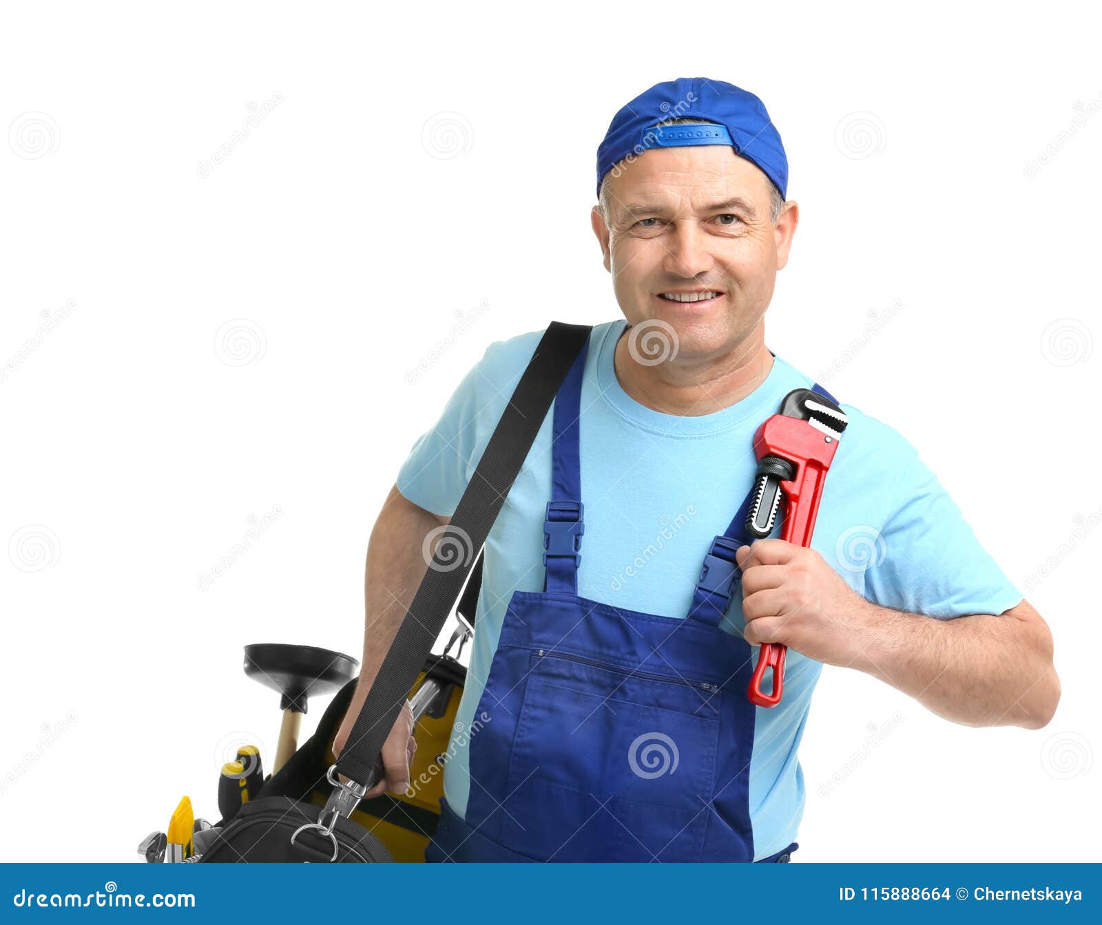 Mature Plumber With Pipe Wrench And Tool Bag Stock Image