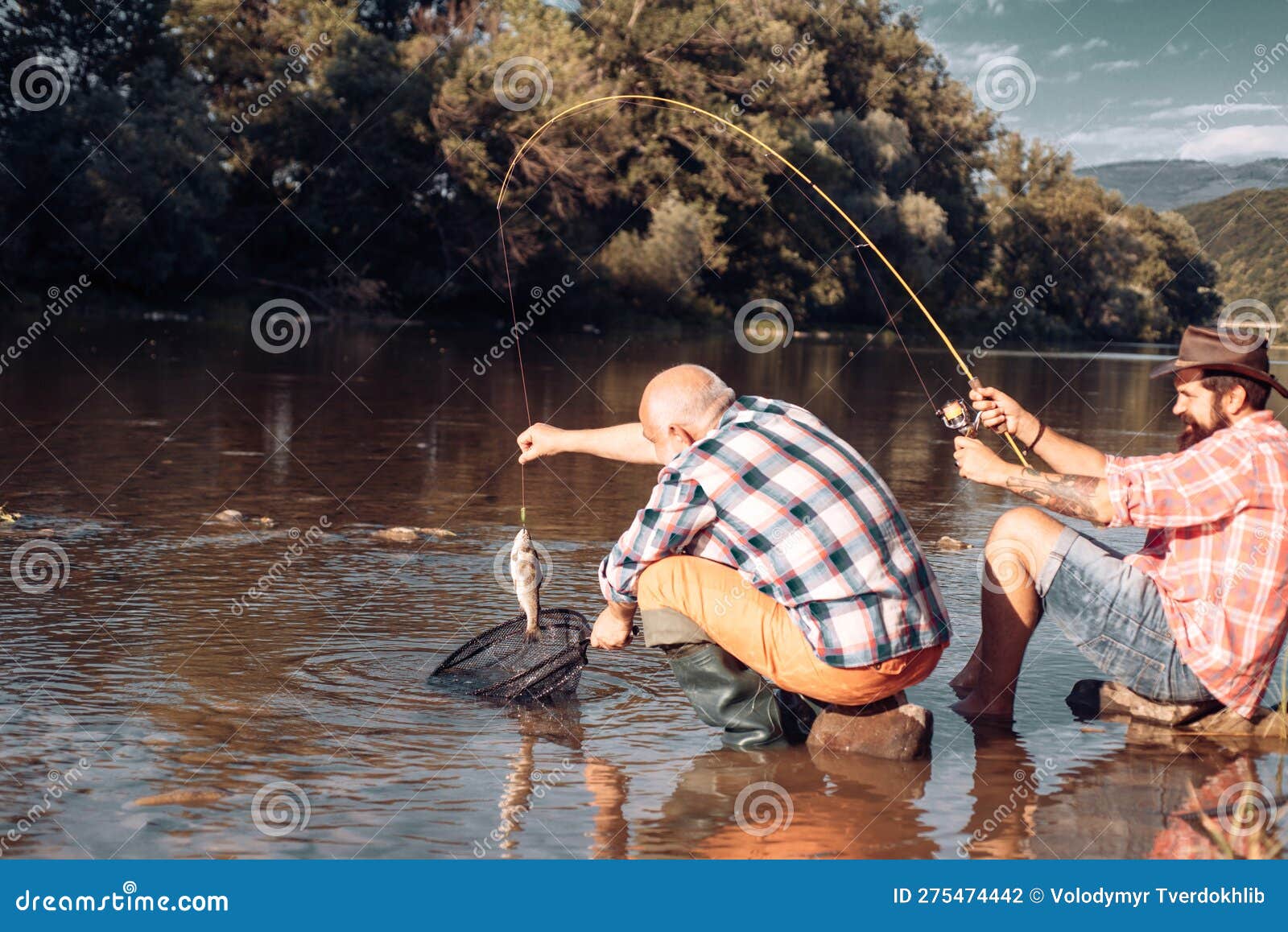 Mature Senior Man with Friend Fishing. Summer Vacation. Happy