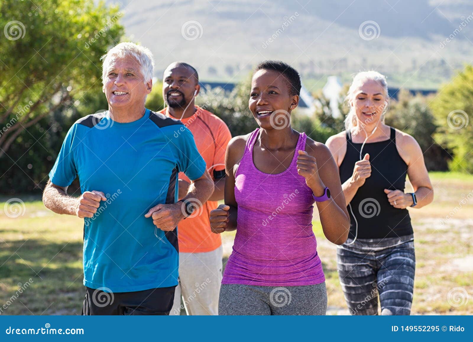 mature and senior people jogging at park
