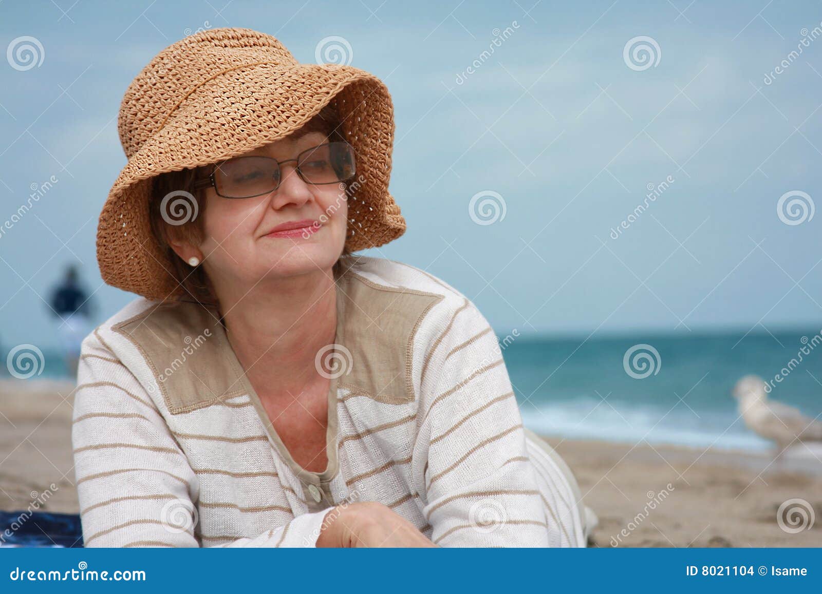 Mature woman at the beach stock photo. Image of holidays - 8021104