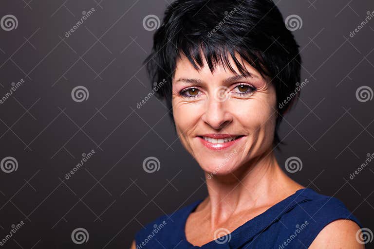 Mature woman closeup stock photo. Image of background - 28702328