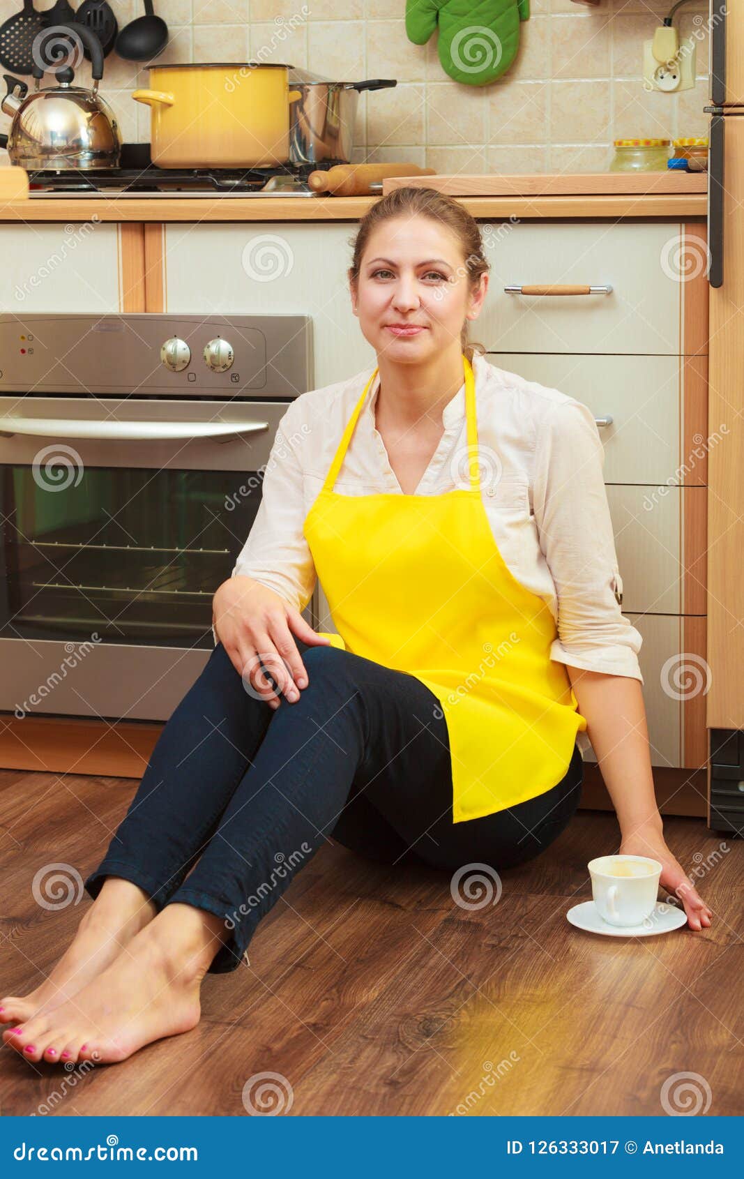 mature wife in kitchen