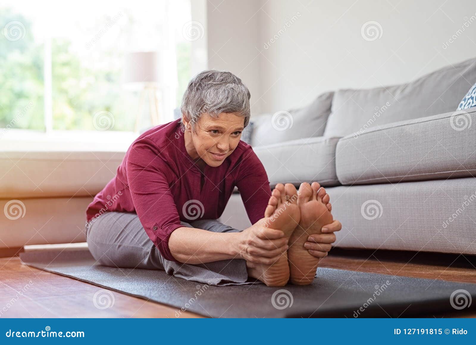 Mature Woman Doing Yoga Exercise At Home Stock Image Image Of