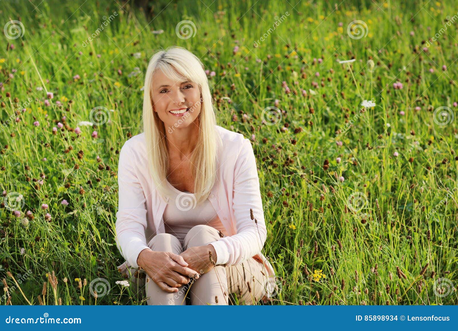 Mature Woman In Flower Field Stock Photo Image O