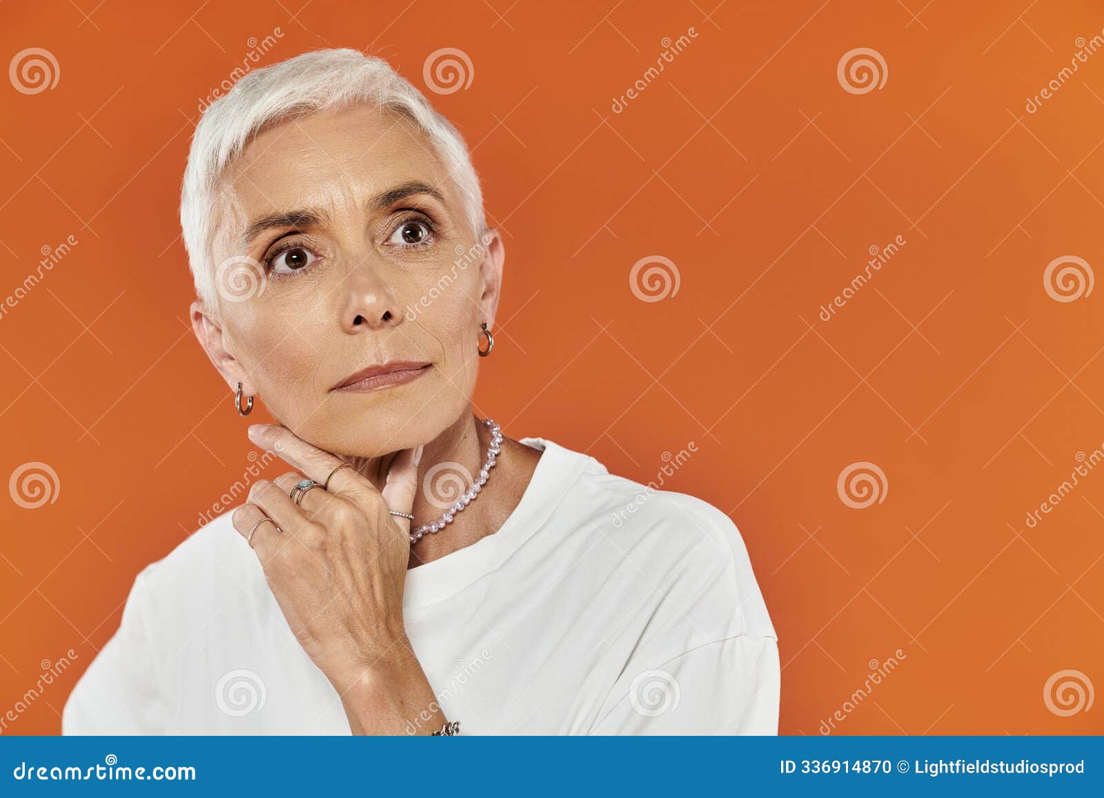 Mature Woman with Short Hair Showcases Stock Photo Image of