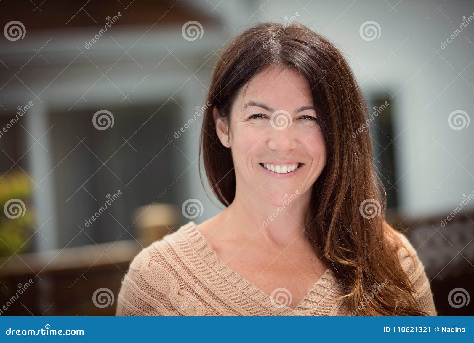 mature woman smiling. outside