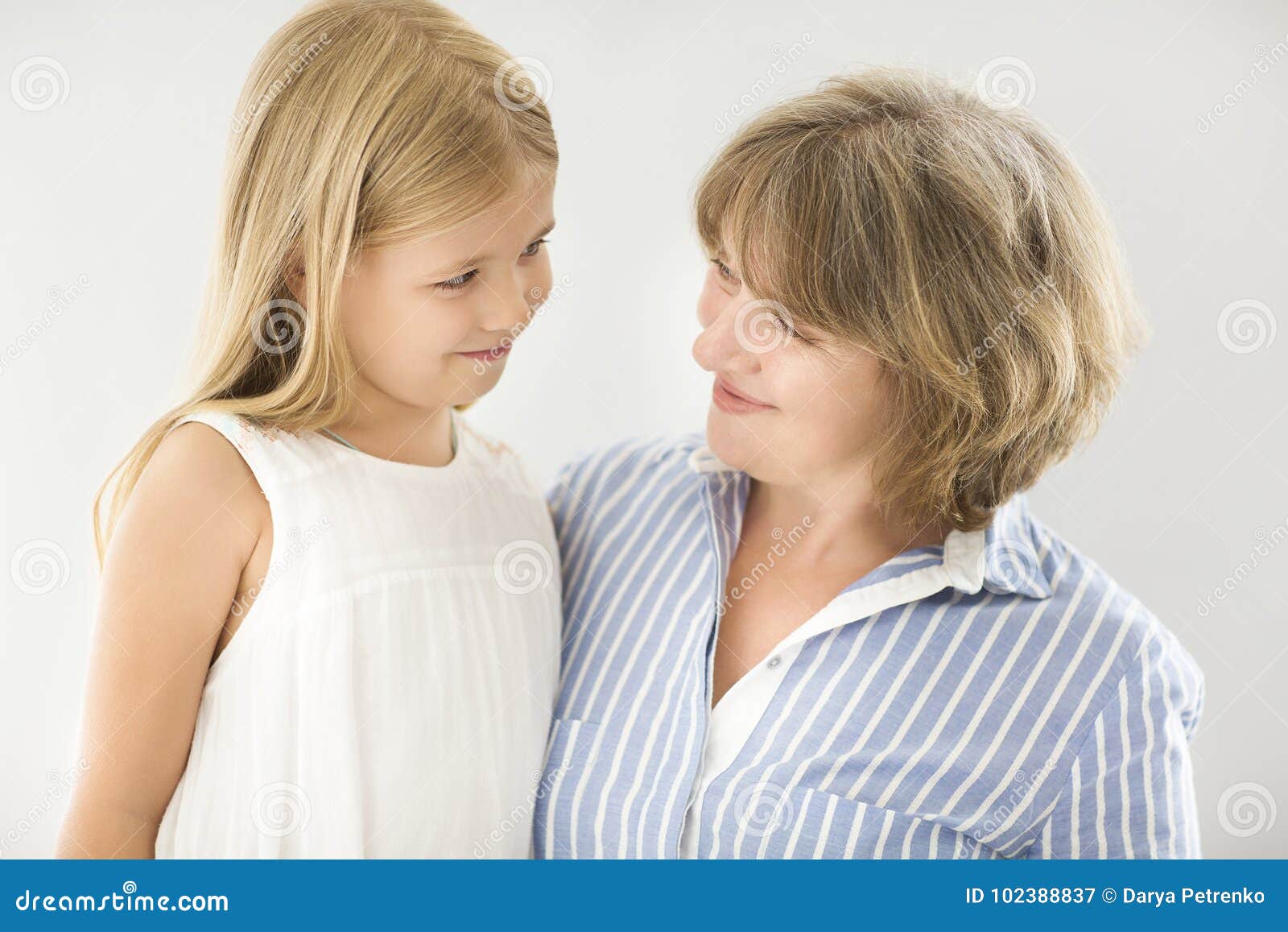 A Mature Woman with a Young Girl.