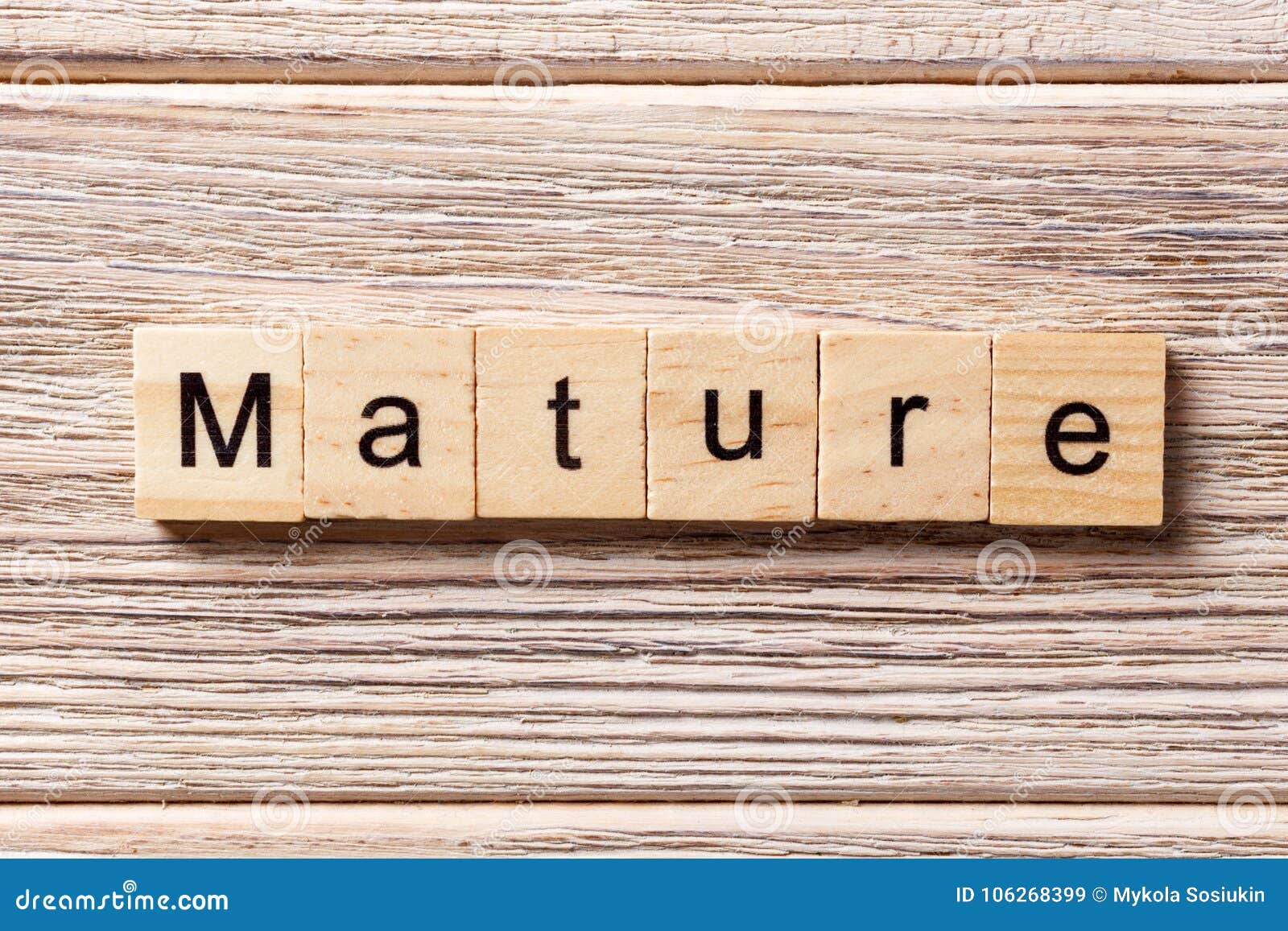 Mature Word Written On Wood Block Mature Text On Table Concept Stock