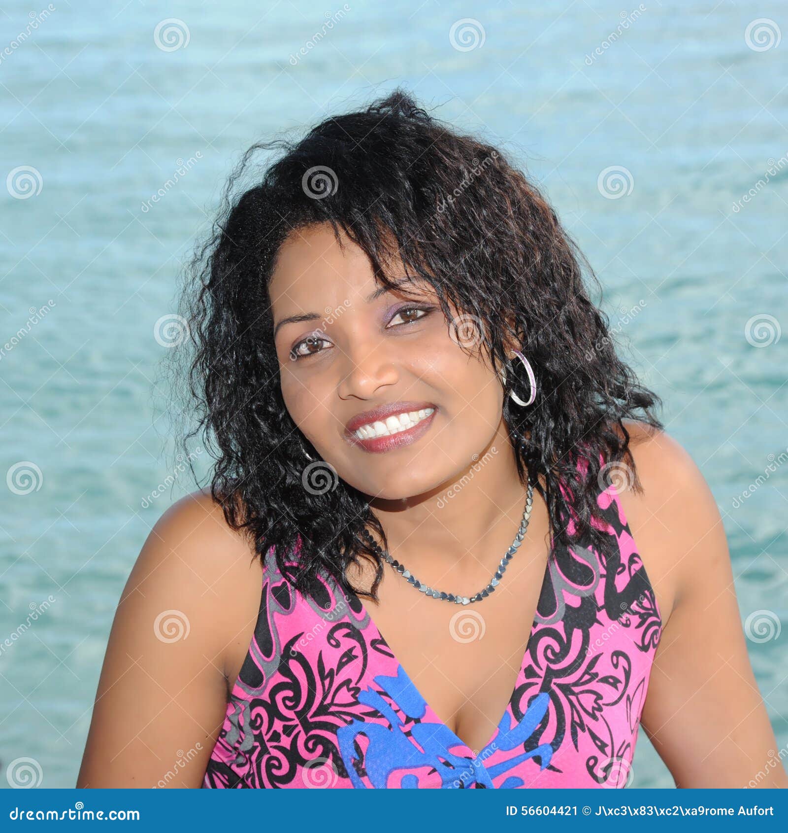 Mauritian woman stock image. Image of rock, smile, charm - 56604421