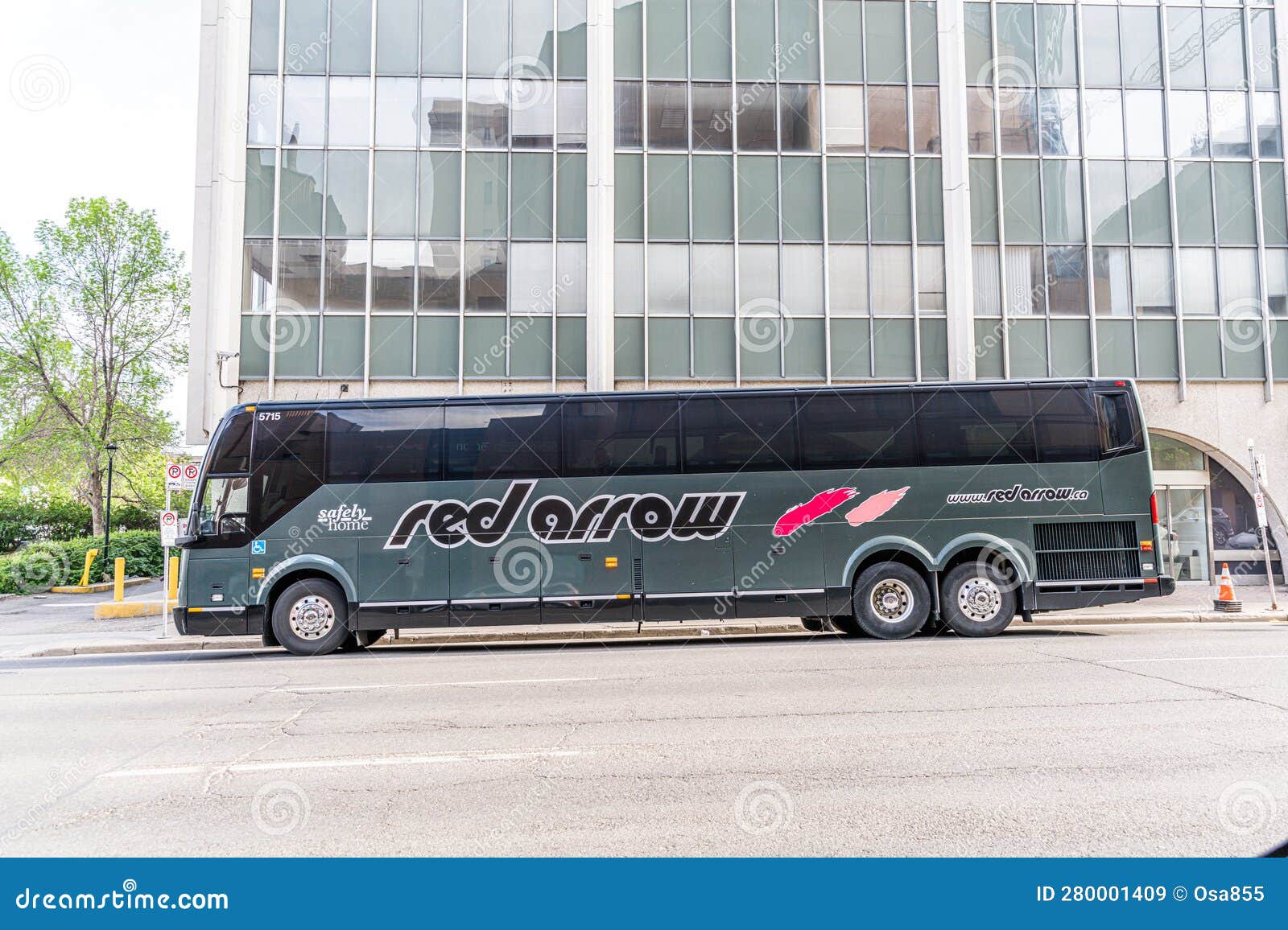 28 May 2023 Calgary Alberta Canada Red Arrow Bus Parked in Downtown Calgary Stock Image