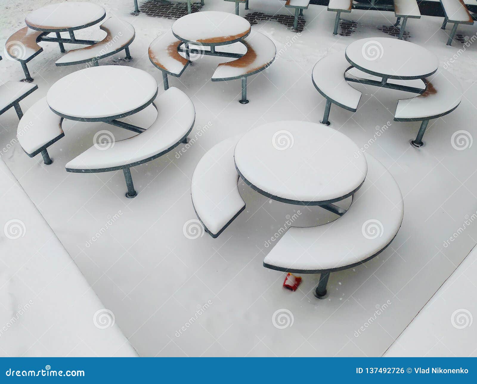 mcdonalds tables in the snow in the city of kiev