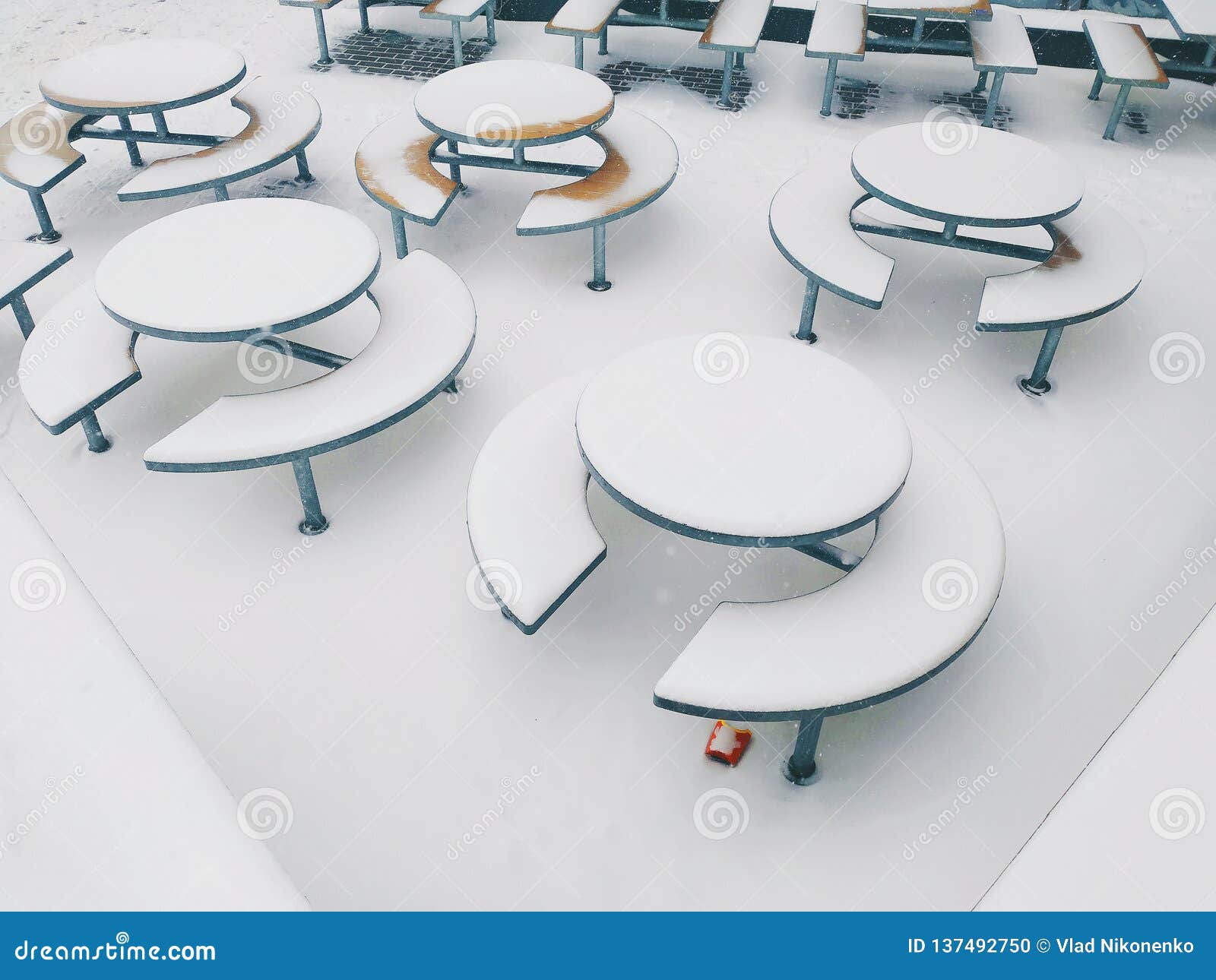 mcdonalds tables in the snow in the city of kiev
