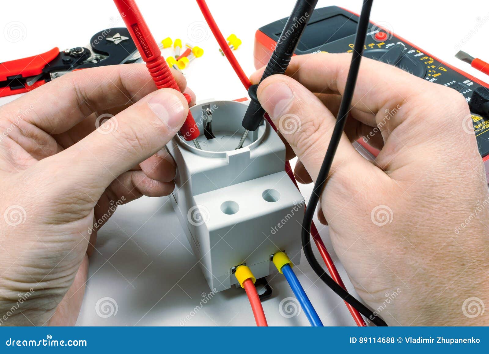 Measurement of Voltage in Electrical Outlet with a Multimeter on a