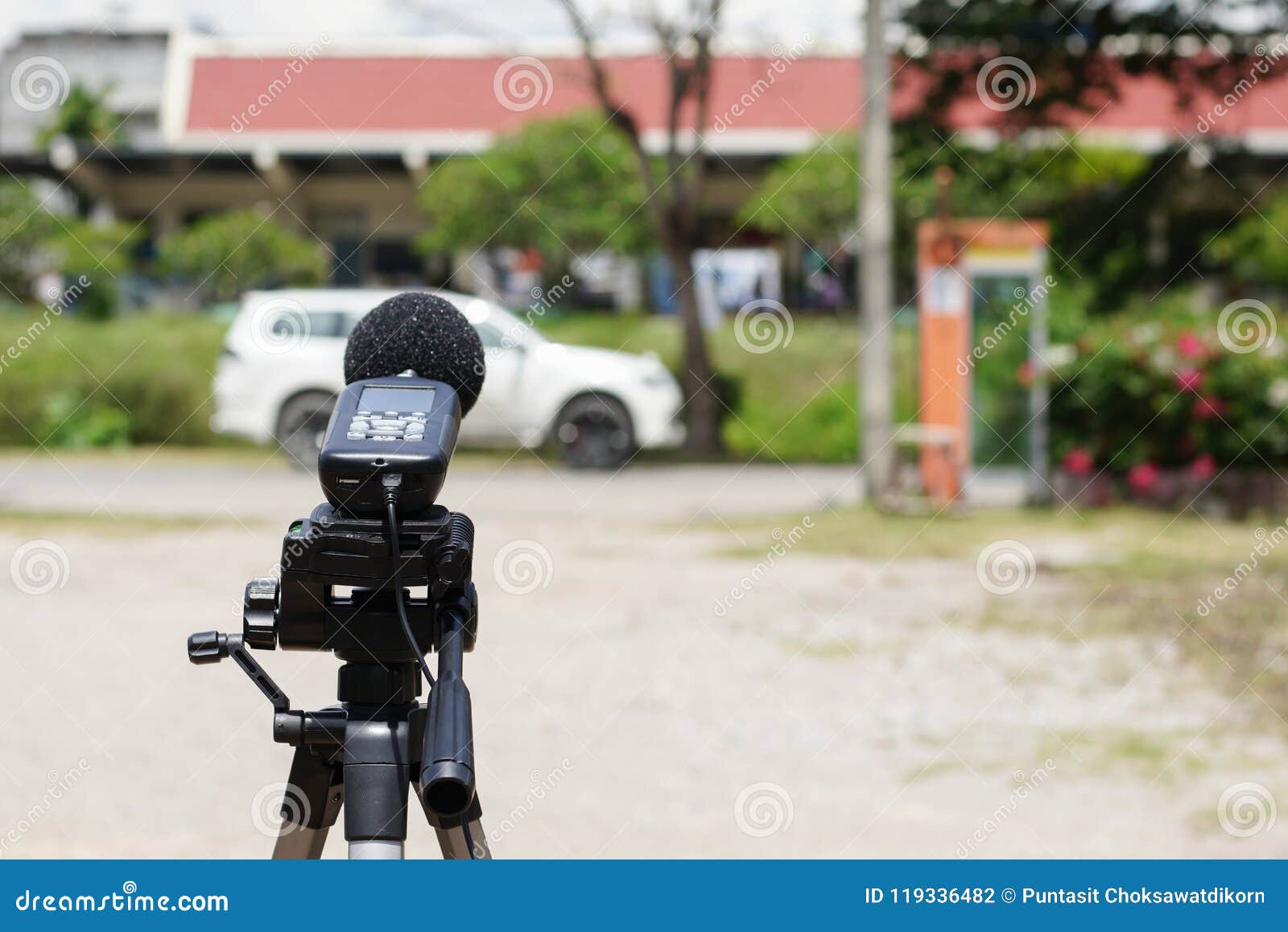 Measuring the Noise on the Road with a Sound Level Meter. Stock Photo