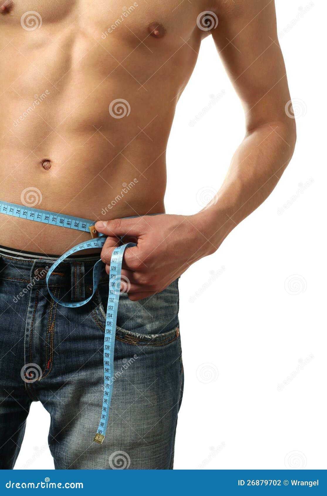 Man measuring his waist with a tape measure 2246454 Stock Photo at