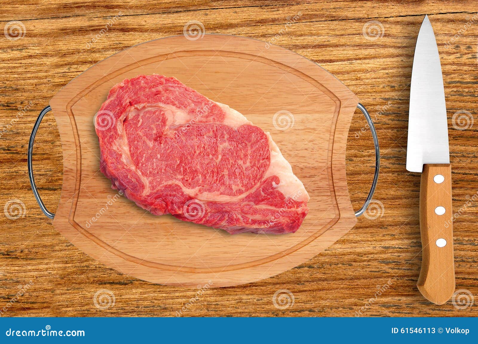 Meat on Cutting Board and Knife on Rustic Wooden Planks Stock Image