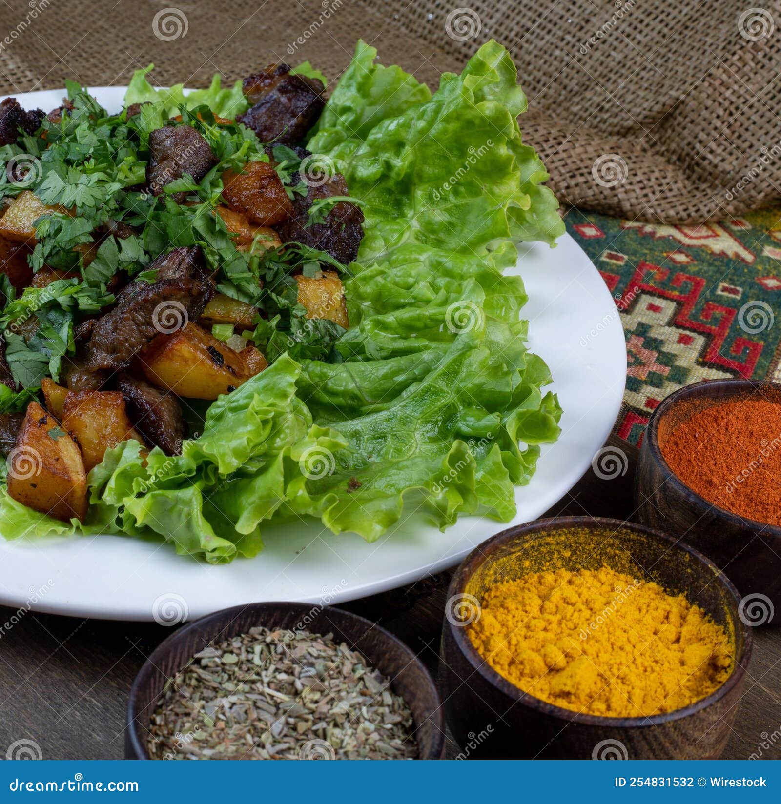 Meat Dish Served with Lettuce and Several Spices Stock Photo Image of
