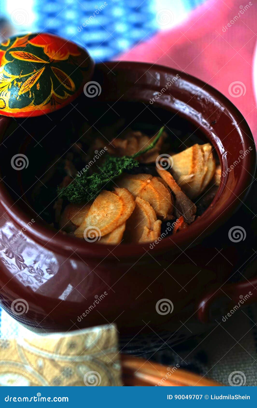 meat with dried plums, potatoes and mushrooms