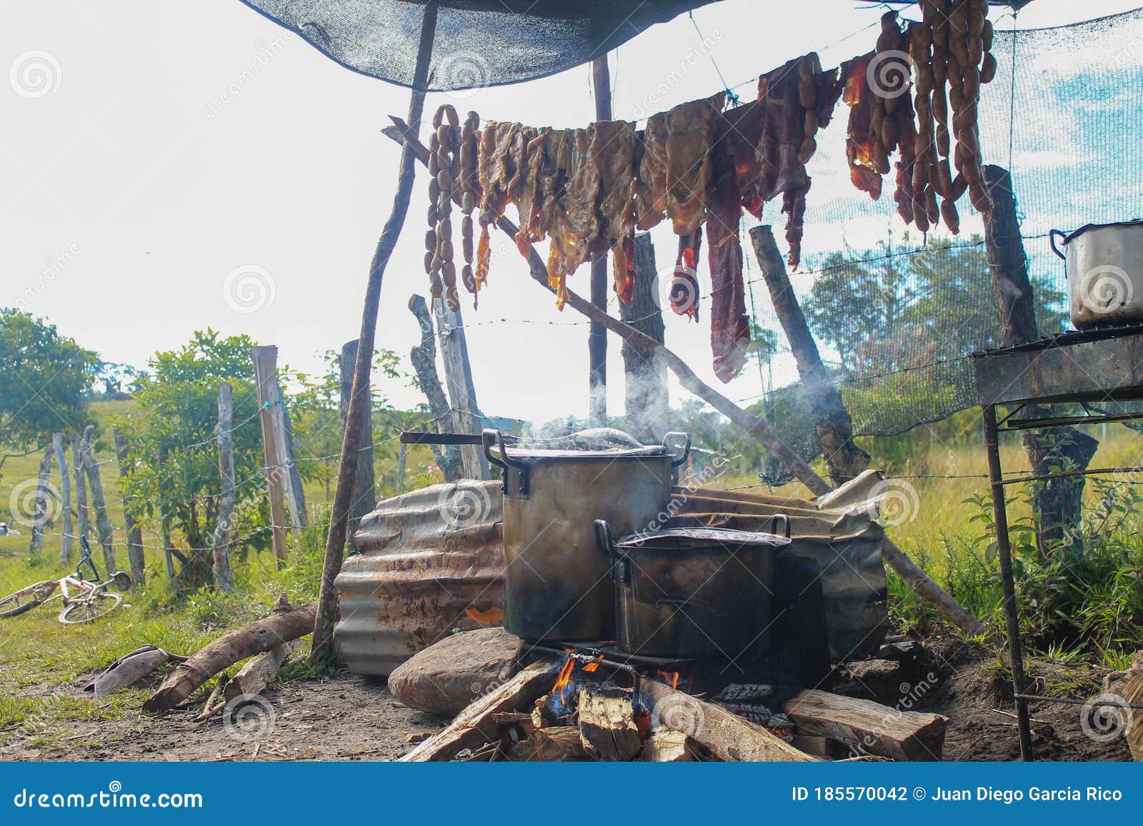 meat exposed to the sun to carry out a traditional cooking process in the colombian countryside