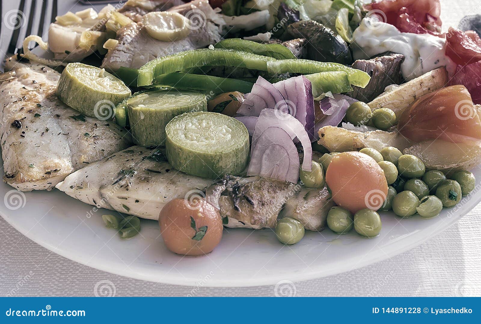 Meat and Fish with Vegetables on a Plate Stock Photo Image of food
