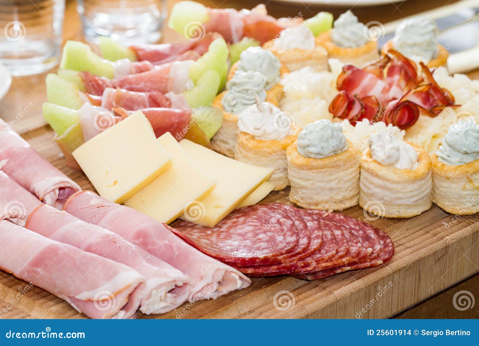 Meat and Fruit Appetizers stock photo. Image of lunchmeat 25601914