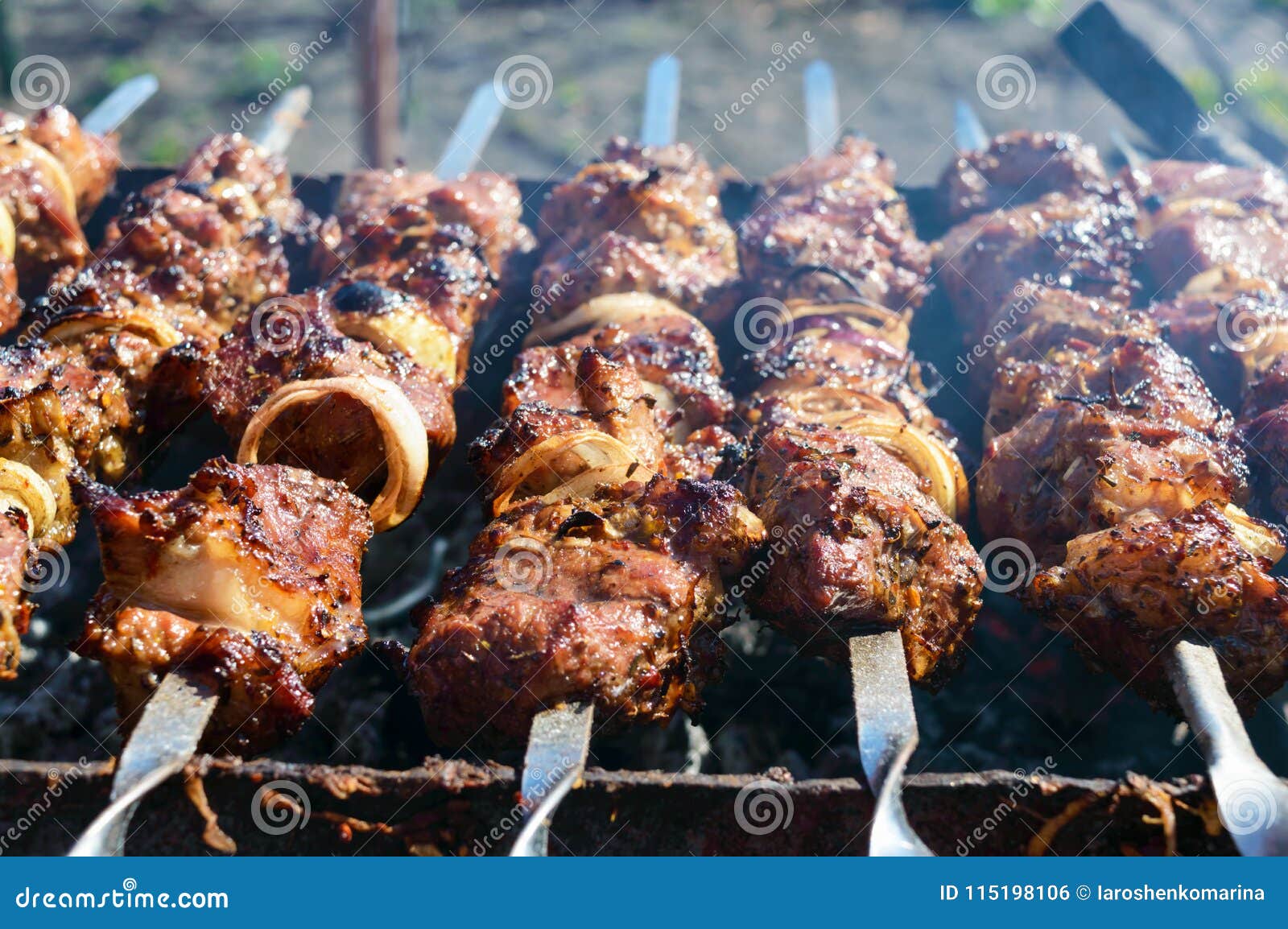 Meat on Iron Skewers, Cooked on an Open Fire. Shish Kebab Roasted ...