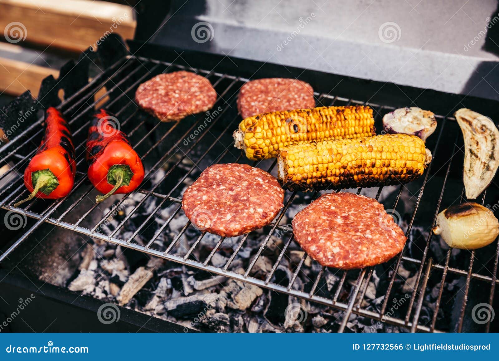 Meat Patties and Vegetables Cooked Outdoors on Grill Stock Photo Image of meat, food 127732566