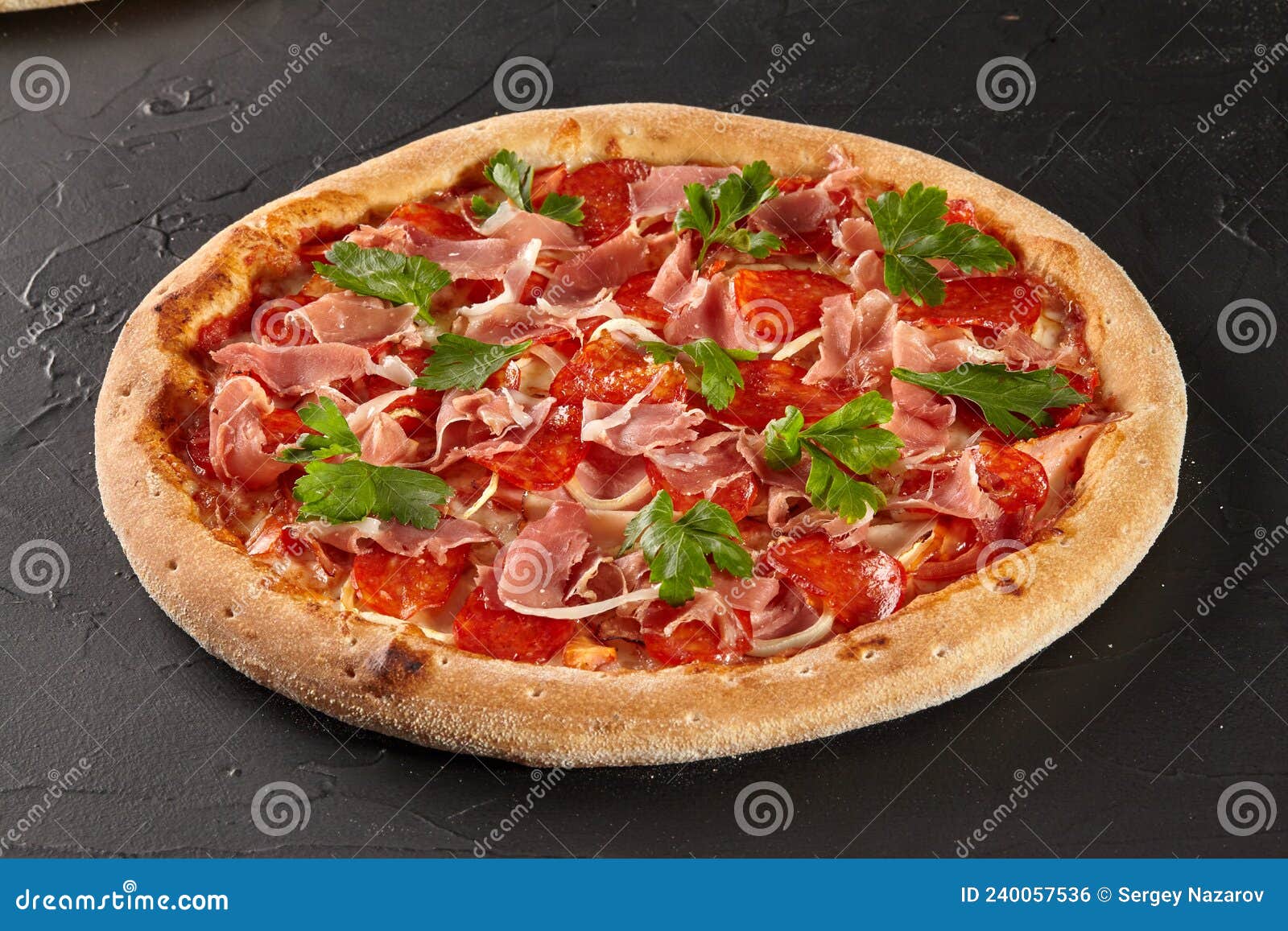 meat pizza with salami, bacon and prosciutto